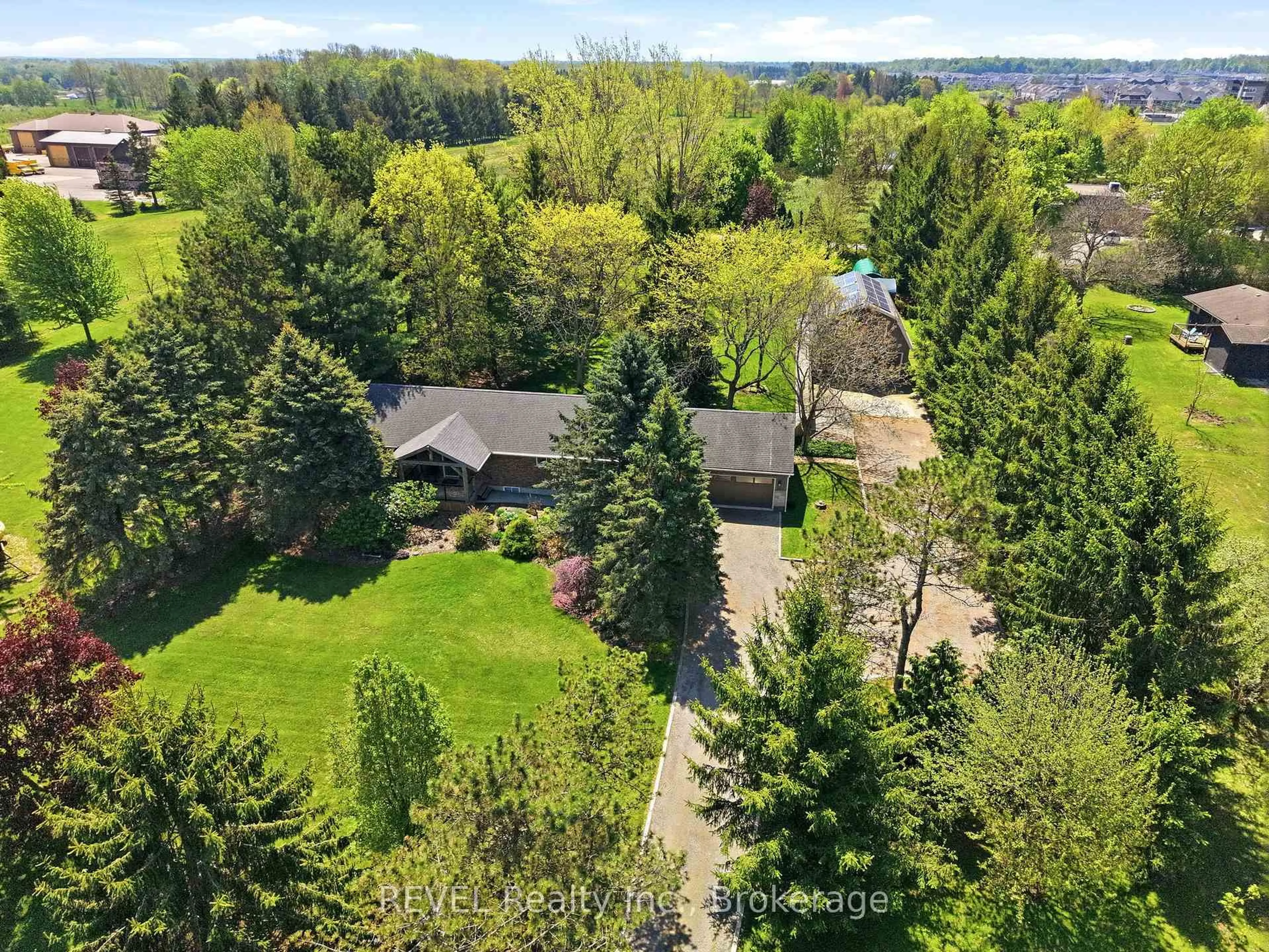 A pic from outside/outdoor area/front of a property/back of a property/a pic from drone, forest/trees view for 200 Hurricane Rd, Pelham Ontario L3E 0V8
