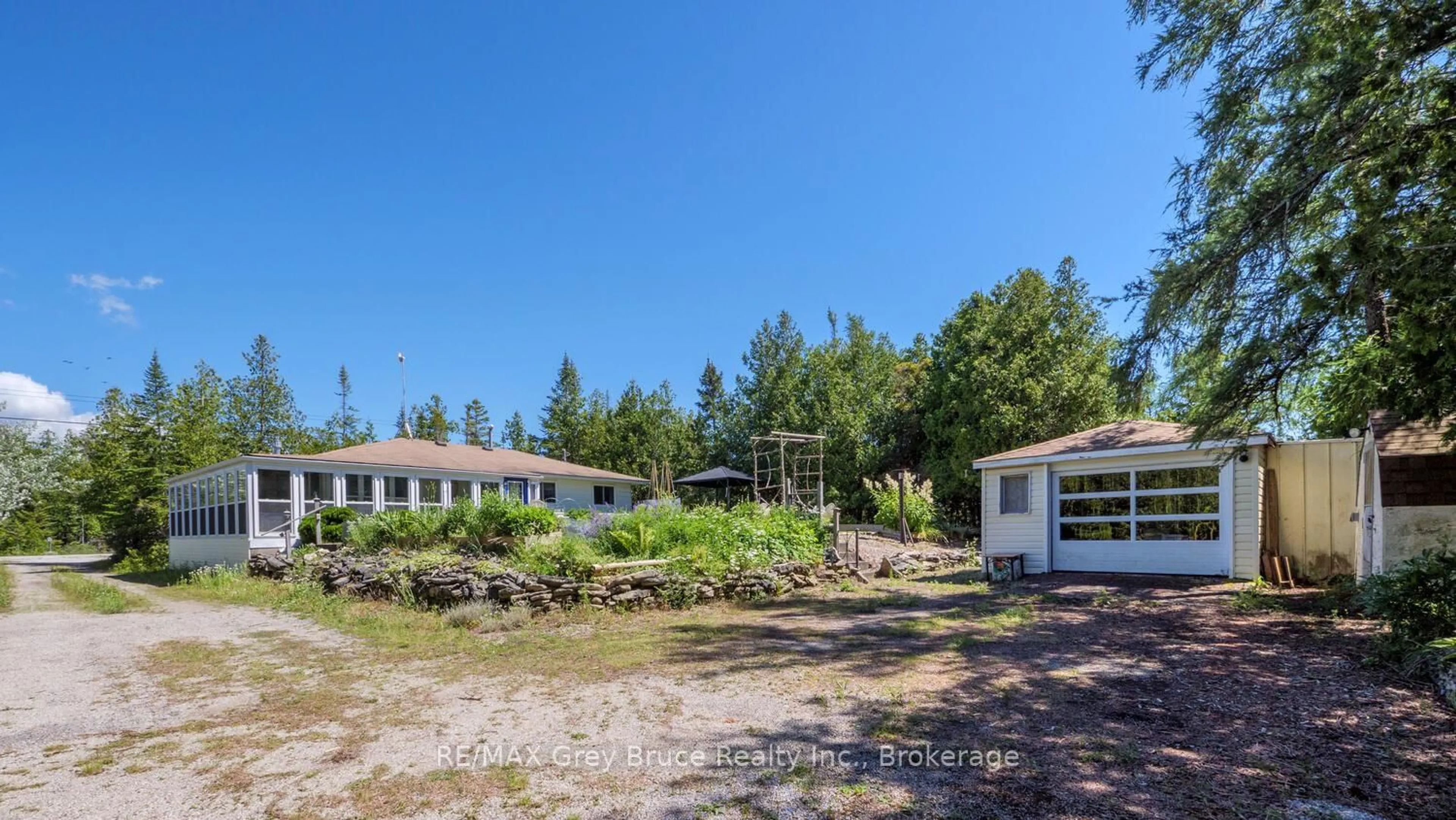 A pic from outside/outdoor area/front of a property/back of a property/a pic from drone, unknown for 1034 DORCAS BAY Rd, Northern Bruce Peninsula Ontario N0H 2R0