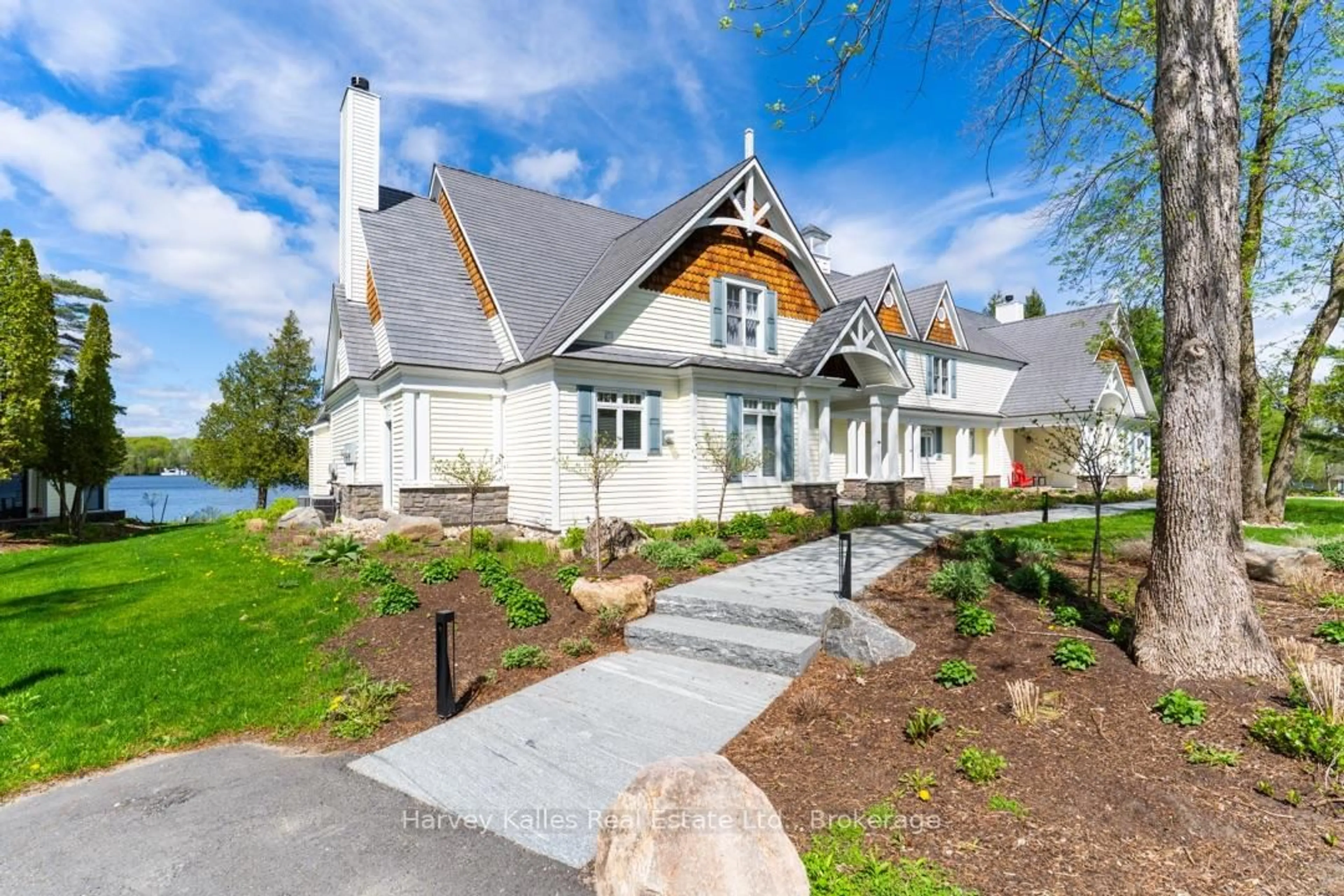 Home with brick exterior material, street for 1131 Elgin House Rd #1, Muskoka Lakes Ontario P0B 1J0