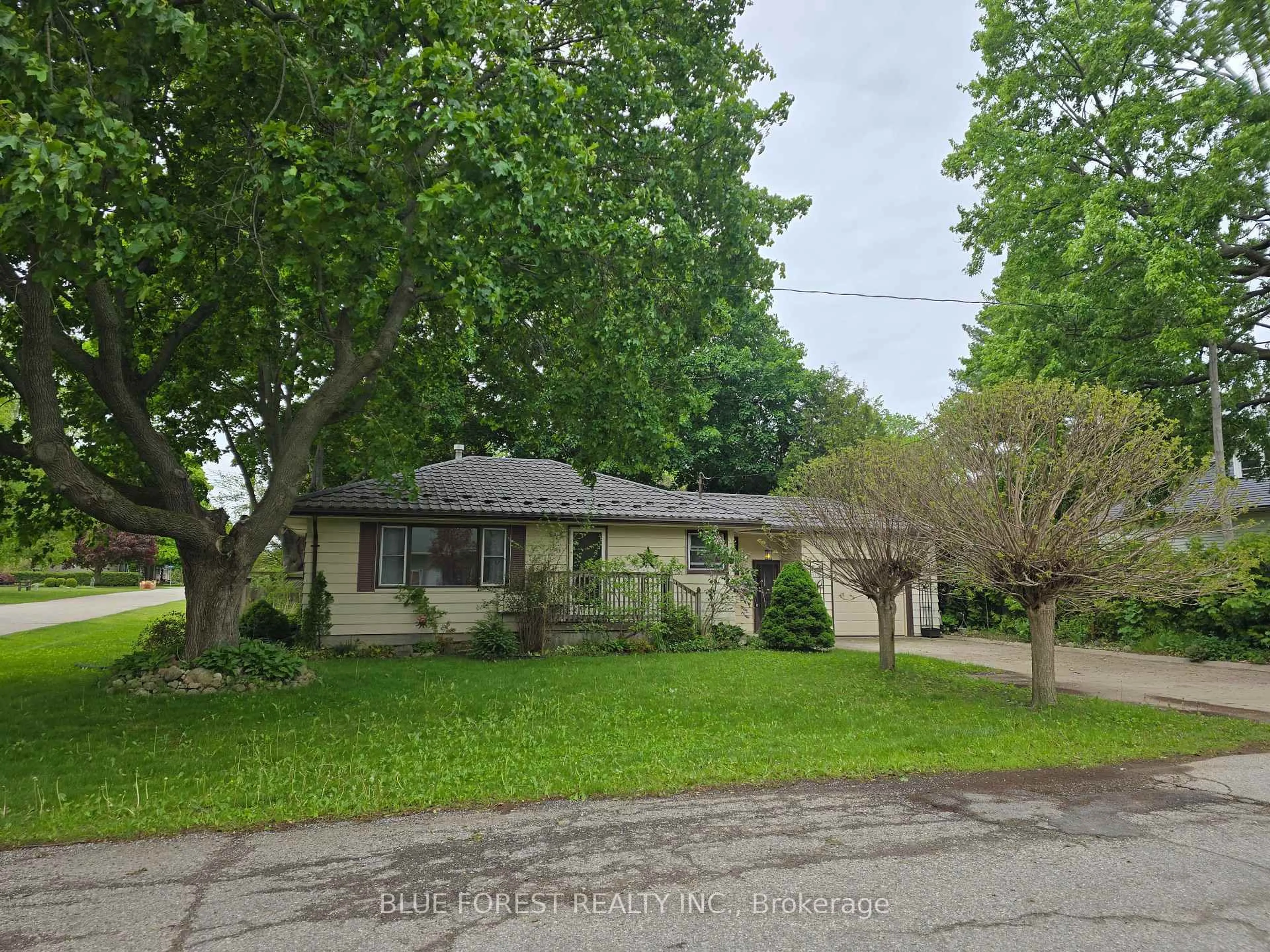 A pic from outside/outdoor area/front of a property/back of a property/a pic from drone, street for 234 Flora St, West Elgin Ontario N0L 2C0