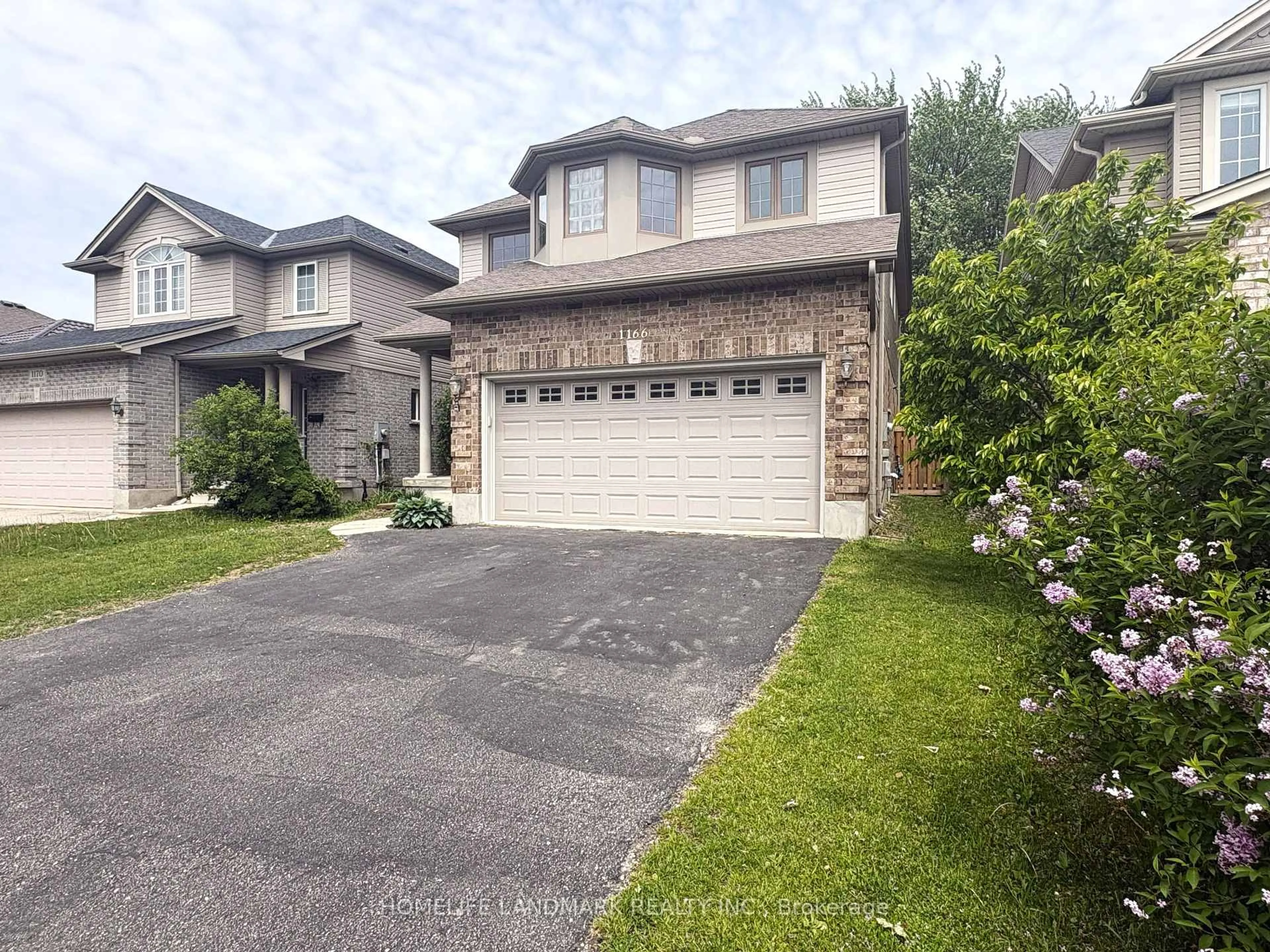 A pic from outside/outdoor area/front of a property/back of a property/a pic from drone, street for 1166 Smither Rd, London North Ontario N6G 5R8