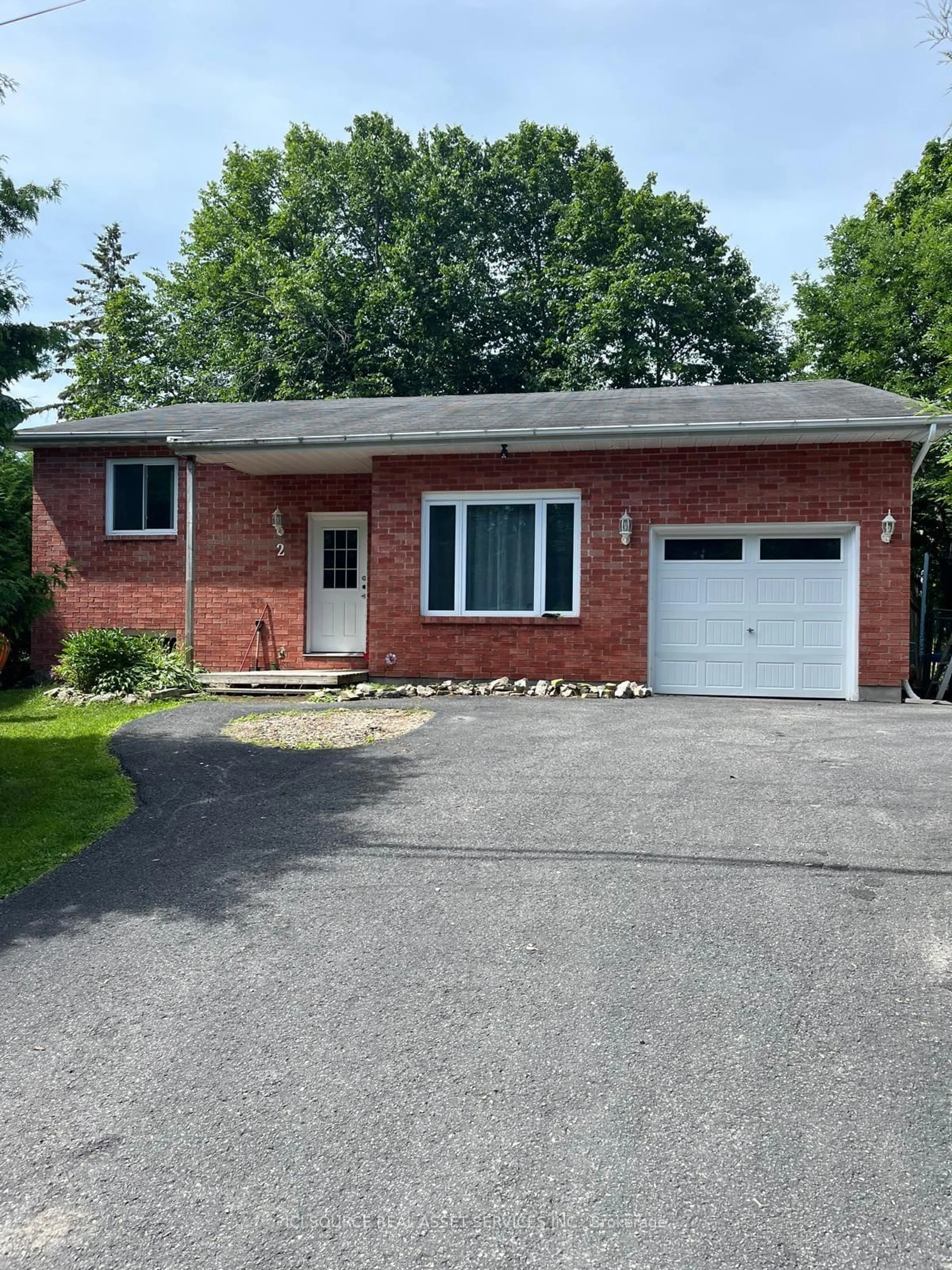 Home with brick exterior material, street for 2 Caribou Ave, Stittsville Ontario K2S 1M5