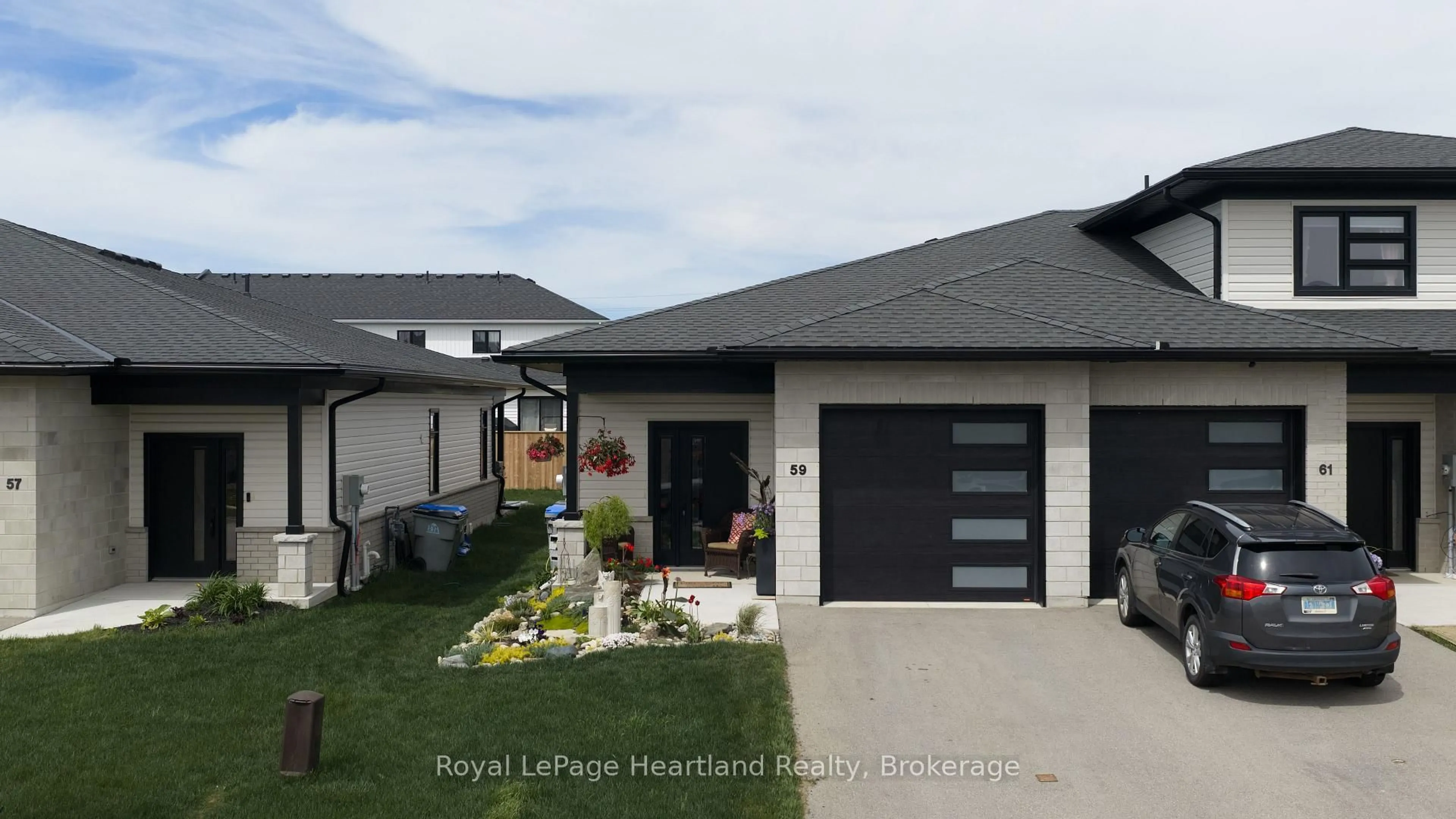 Home with vinyl exterior material, street for 59 Briarhill Rd, Huron East Ontario N0K 1W0