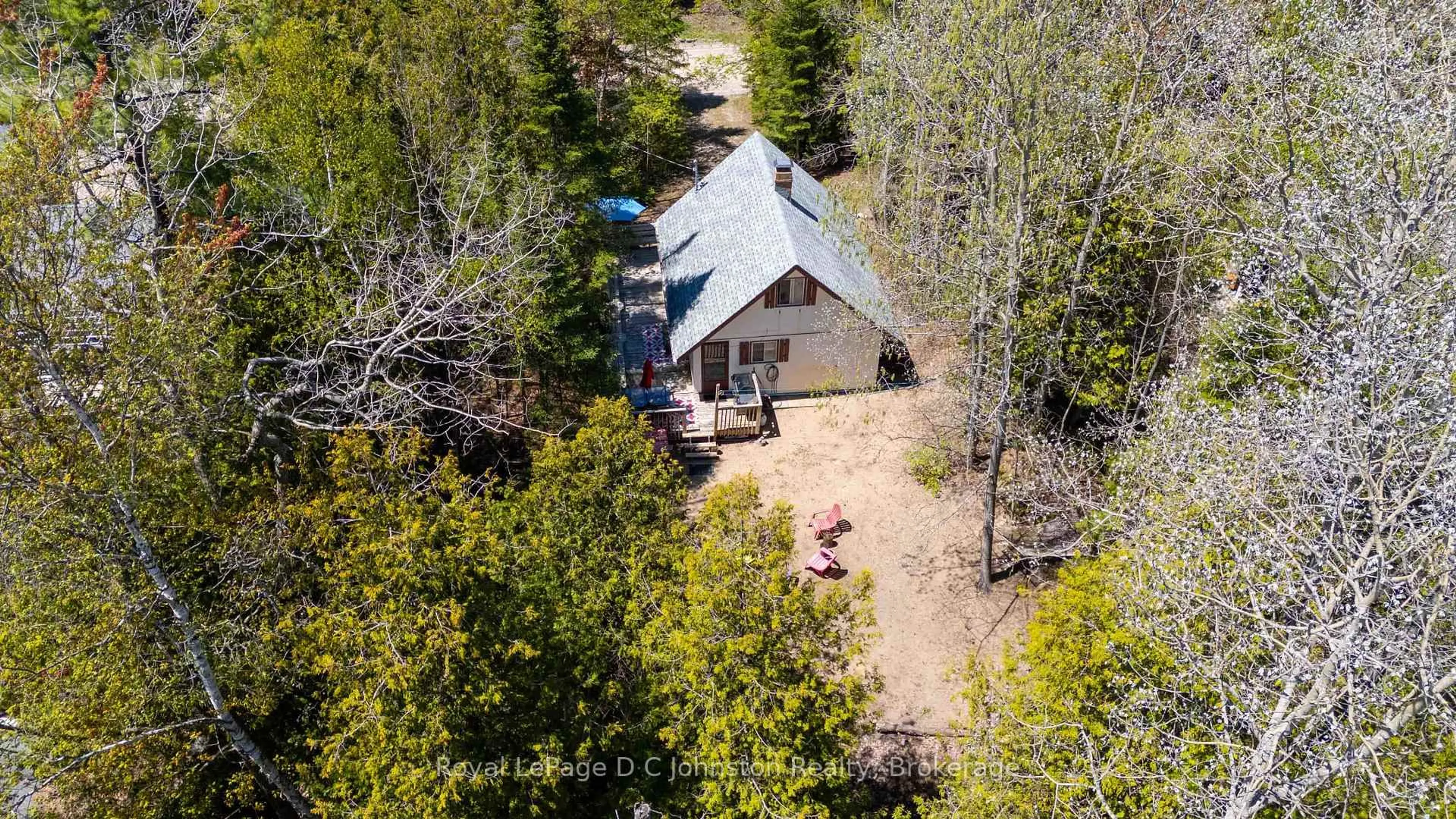 A pic from outside/outdoor area/front of a property/back of a property/a pic from drone, forest/trees view for 102 Thompson Ave, Native Leased Lands Ontario N0H 2G0