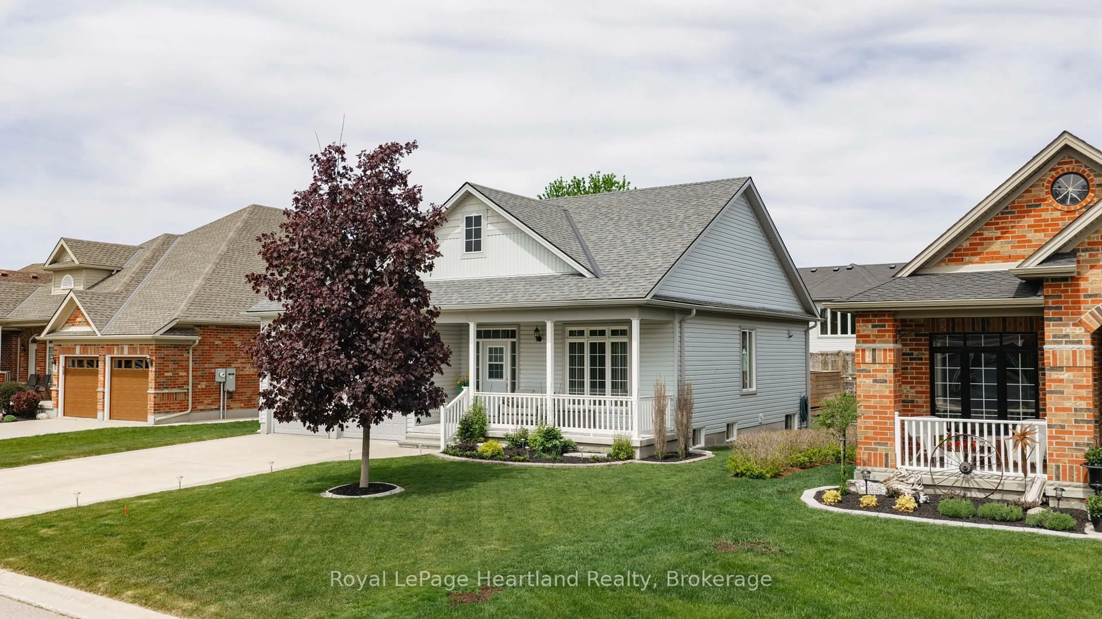 Home with vinyl exterior material, street for 36 Stornoway Cres, Huron East Ontario N0K 1W0