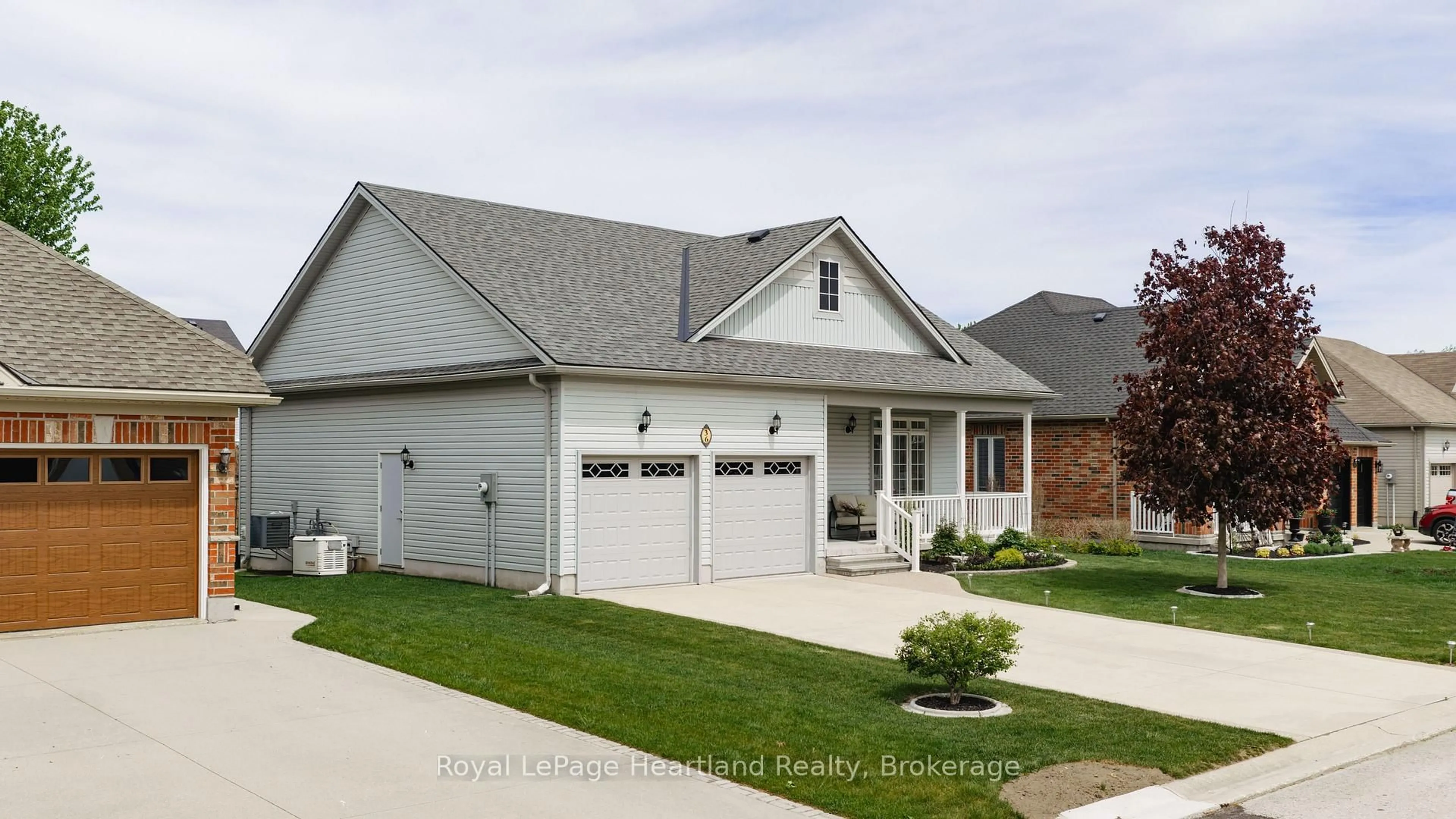 Home with vinyl exterior material, street for 36 Stornoway Cres, Huron East Ontario N0K 1W0