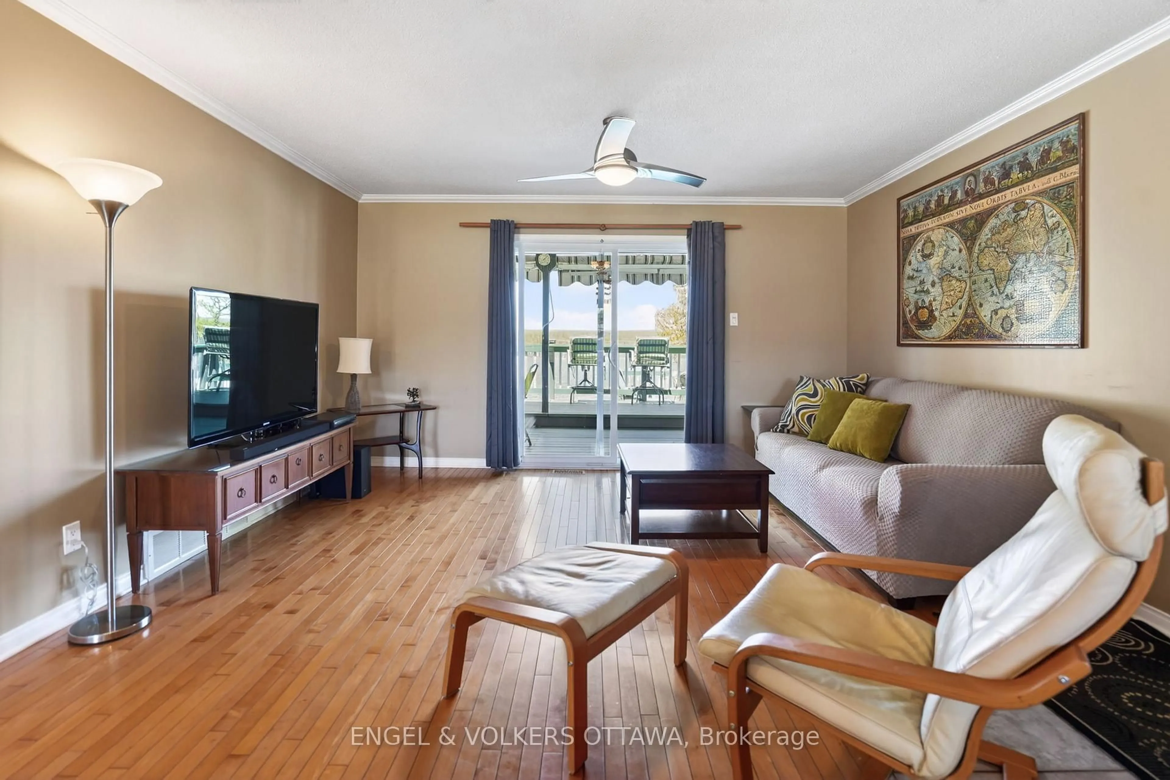 Living room with furniture, wood/laminate floor for 3459 Principale St, Alfred and Plantagenet Ontario K0A 3K0