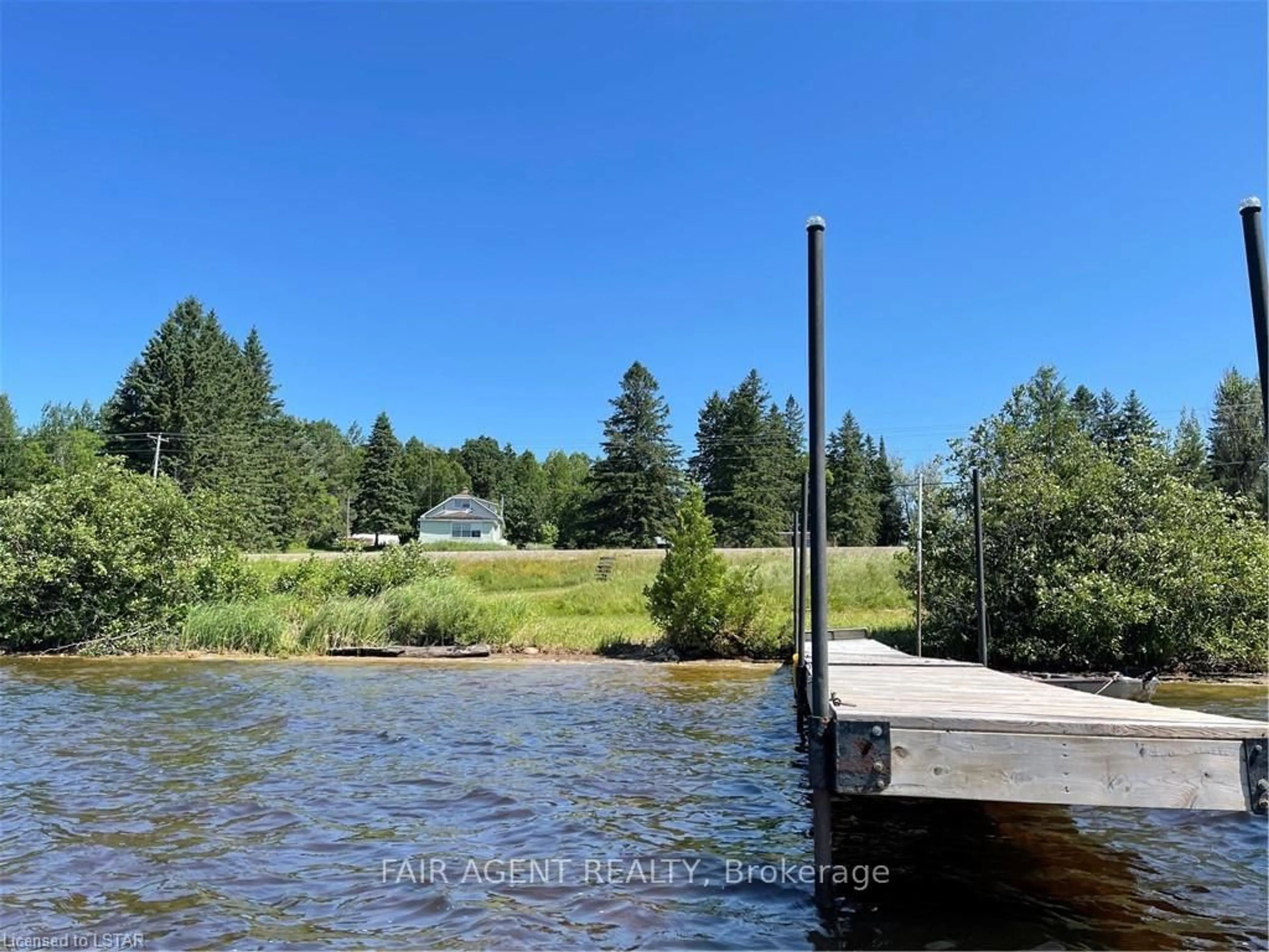A pic from outside/outdoor area/front of a property/back of a property/a pic from drone, water/lake/river/ocean view for 2442 HIGHWAY 520, Magnetawan Ontario P0A 1C0