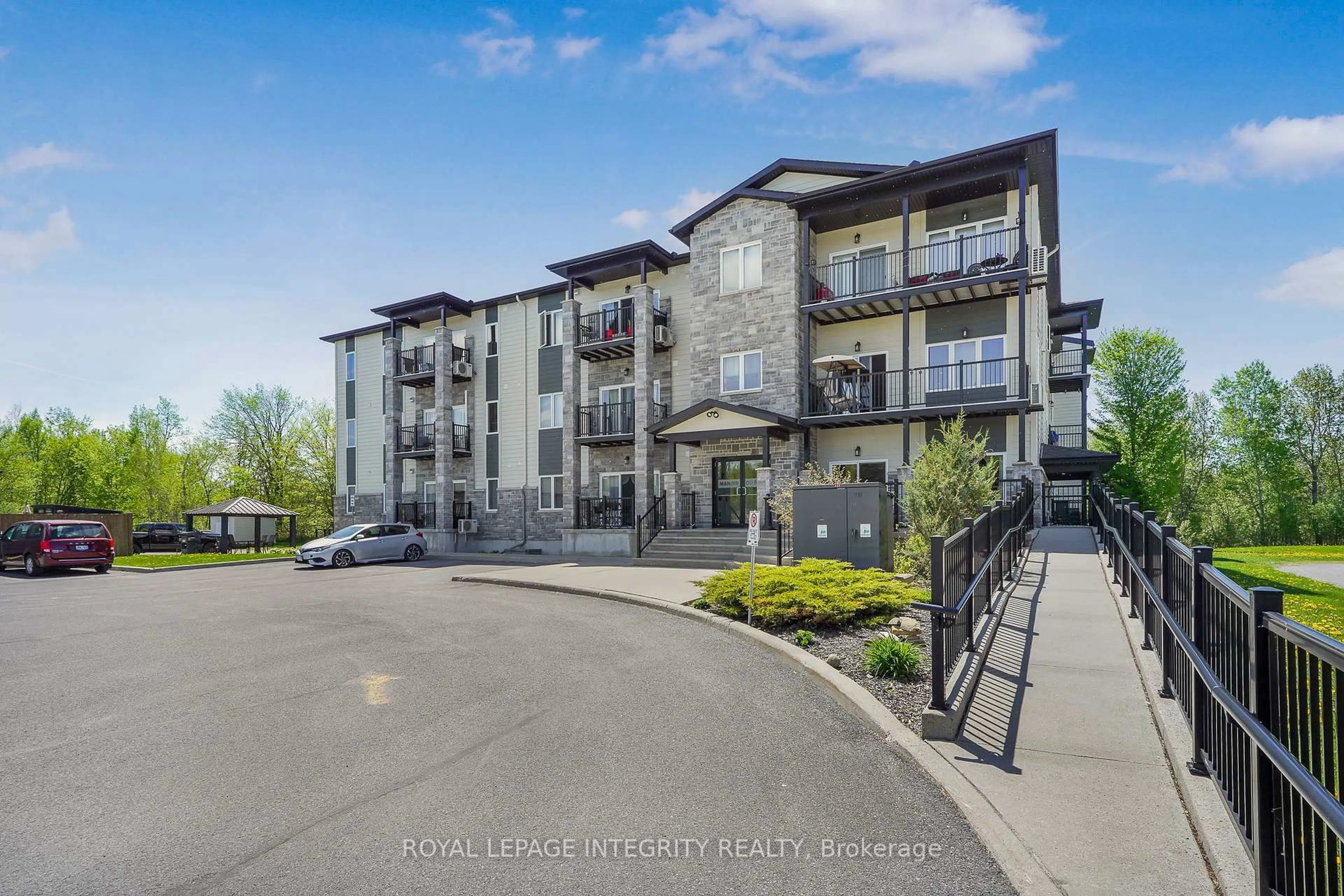 A pic from outside/outdoor area/front of a property/back of a property/a pic from drone, unknown for 48 Des Benevoles St #208, The Nation Ontario K0A 2M0