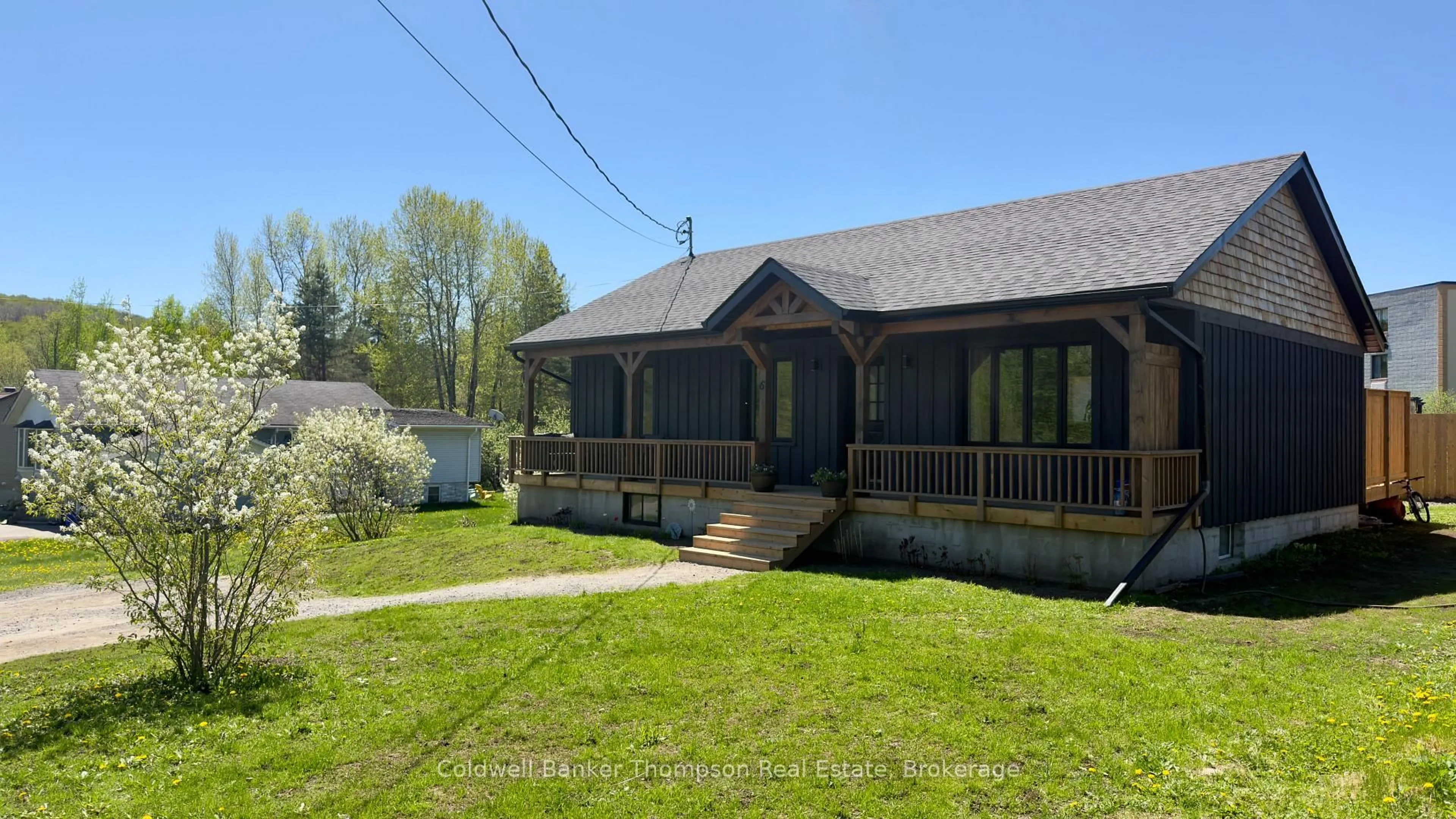 A pic from outside/outdoor area/front of a property/back of a property/a pic from drone, unknown for 6 Kitchen Rd, Huntsville Ontario P1H 1Y1