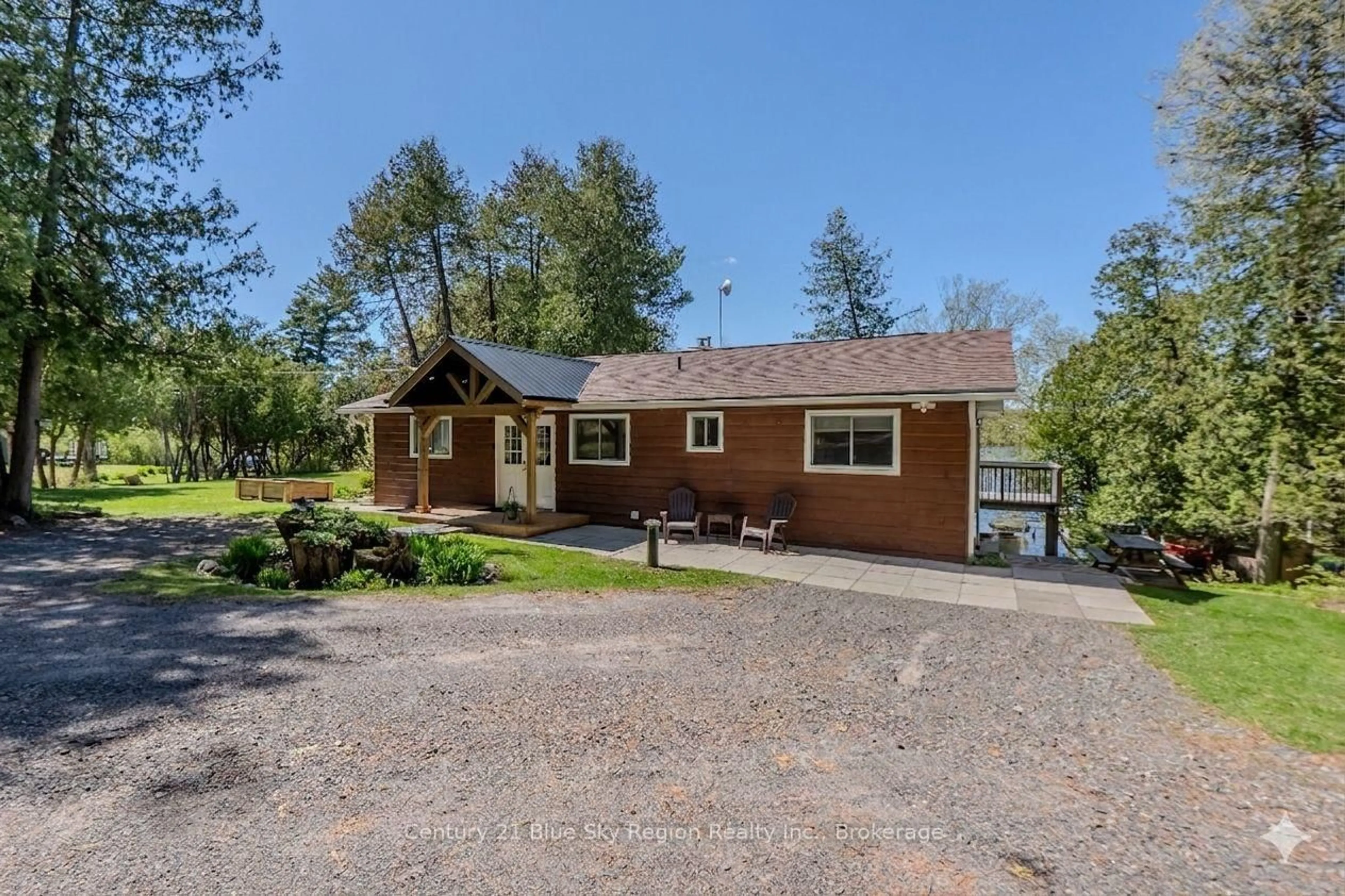 A pic from outside/outdoor area/front of a property/back of a property/a pic from drone, water/lake/river/ocean view for 12 Cherry Lane, East Ferris Ontario P0H 1K0