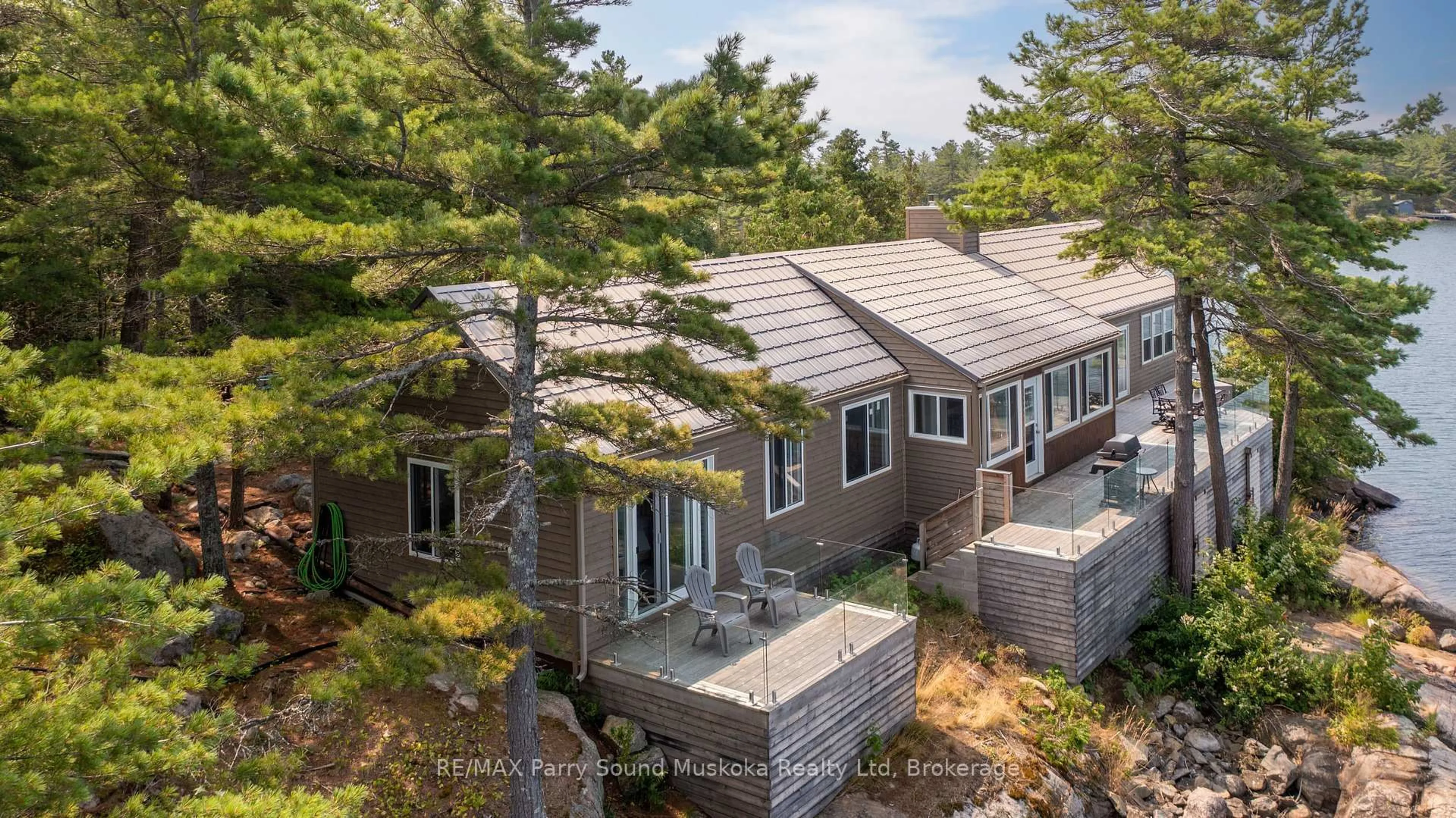 A pic from outside/outdoor area/front of a property/back of a property/a pic from drone, unknown for 2 A258 Island, The Archipelago Ontario P0G 1K0