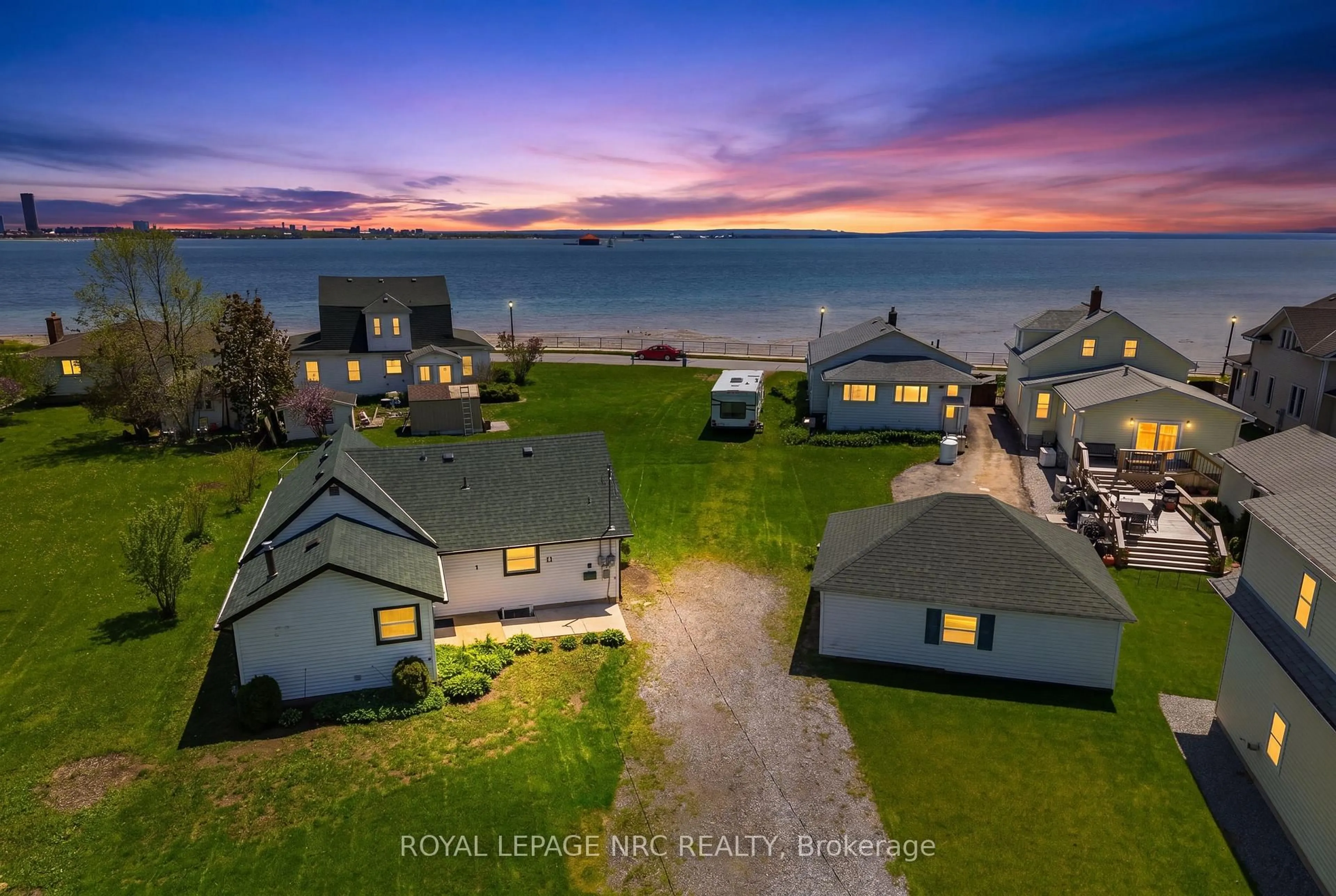 A pic from outside/outdoor area/front of a property/back of a property/a pic from drone, water/lake/river/ocean view for 11 White Ave, Fort Erie Ontario L2A 1C6
