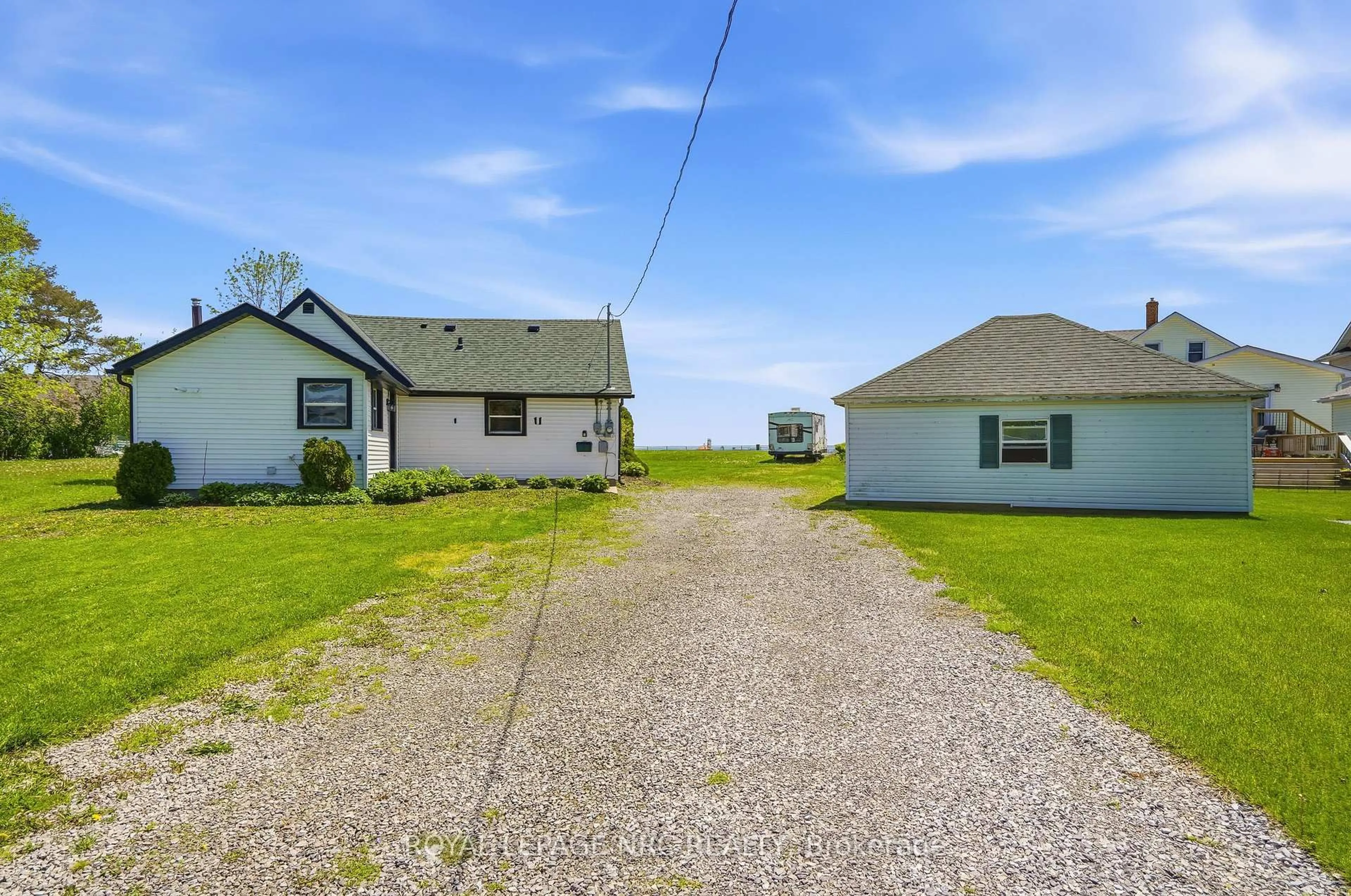 A pic from outside/outdoor area/front of a property/back of a property/a pic from drone, unknown for 11 White Ave, Fort Erie Ontario L2A 1C6
