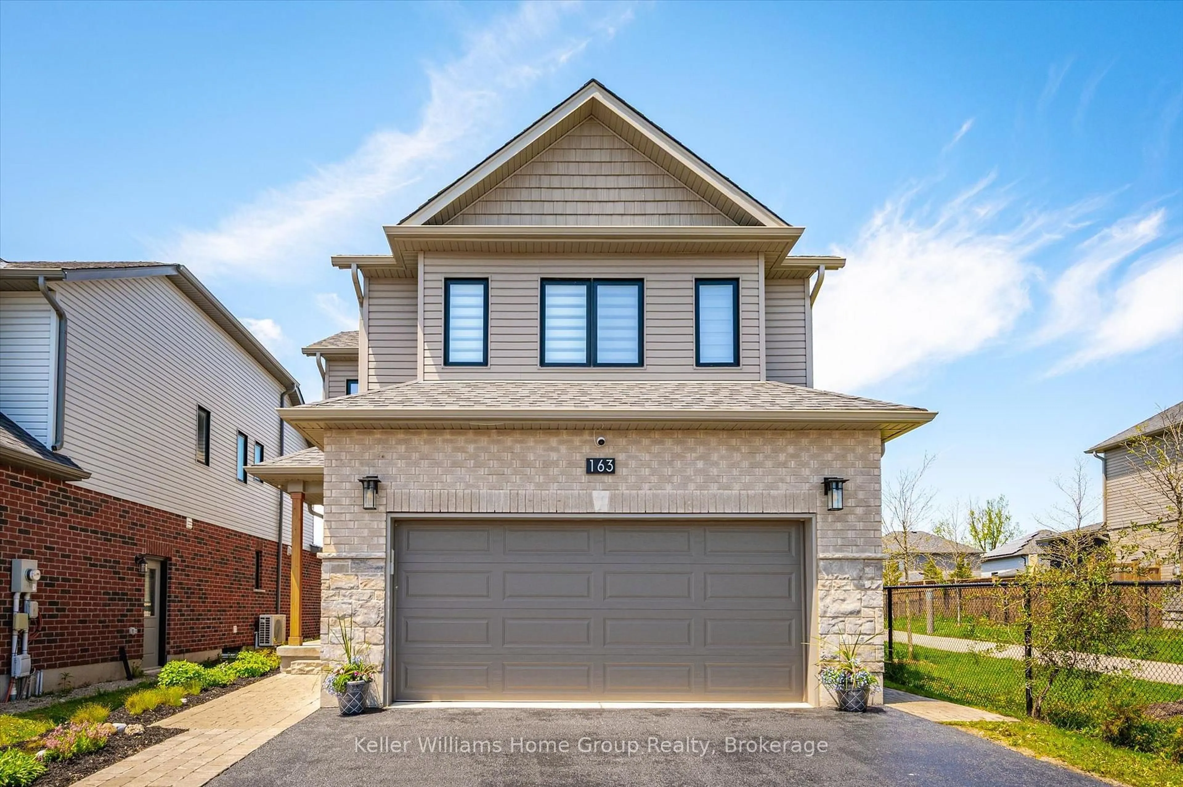 Home with brick exterior material, street for 163 Halls Dr, Centre Wellington Ontario N0B 1S0