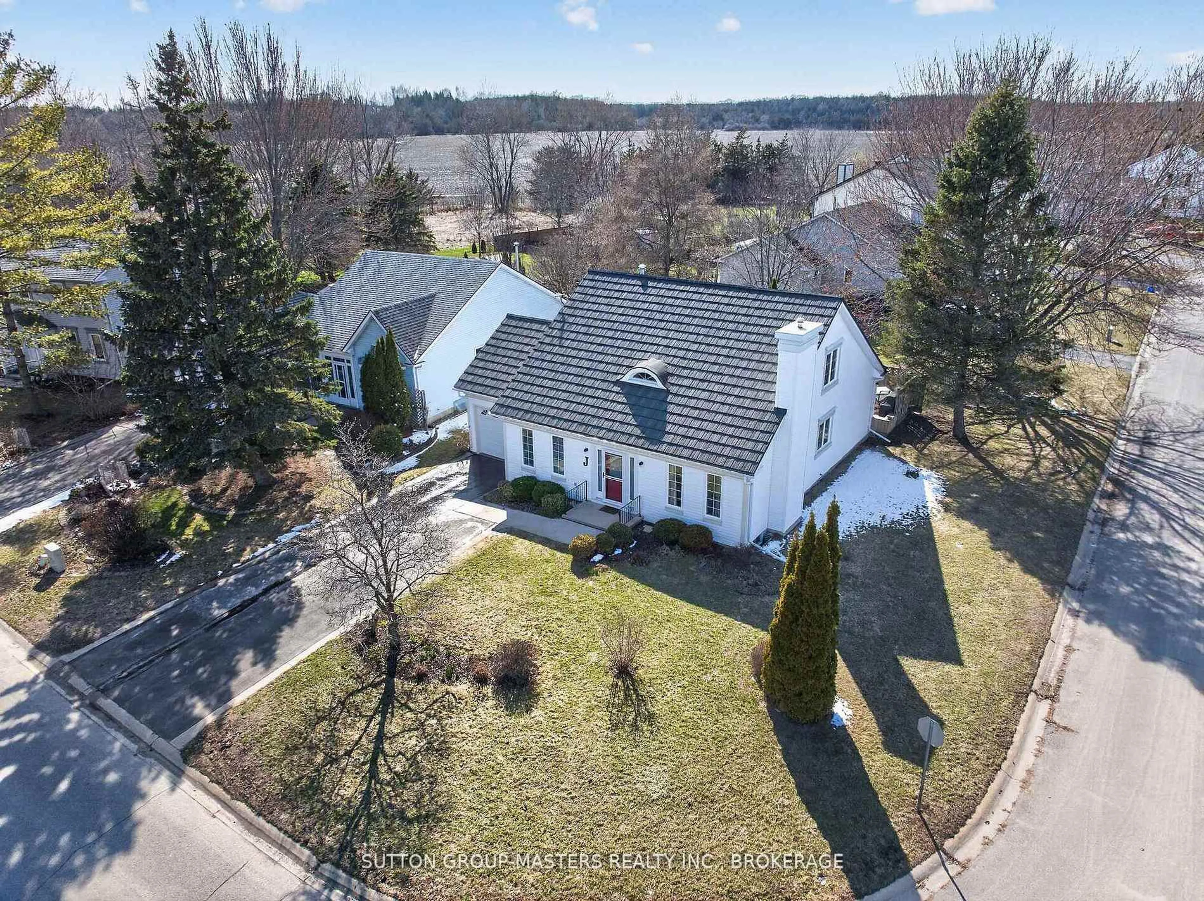 A pic from outside/outdoor area/front of a property/back of a property/a pic from drone, street for 16 Country Club Dr, Bath Ontario K0H 1G0