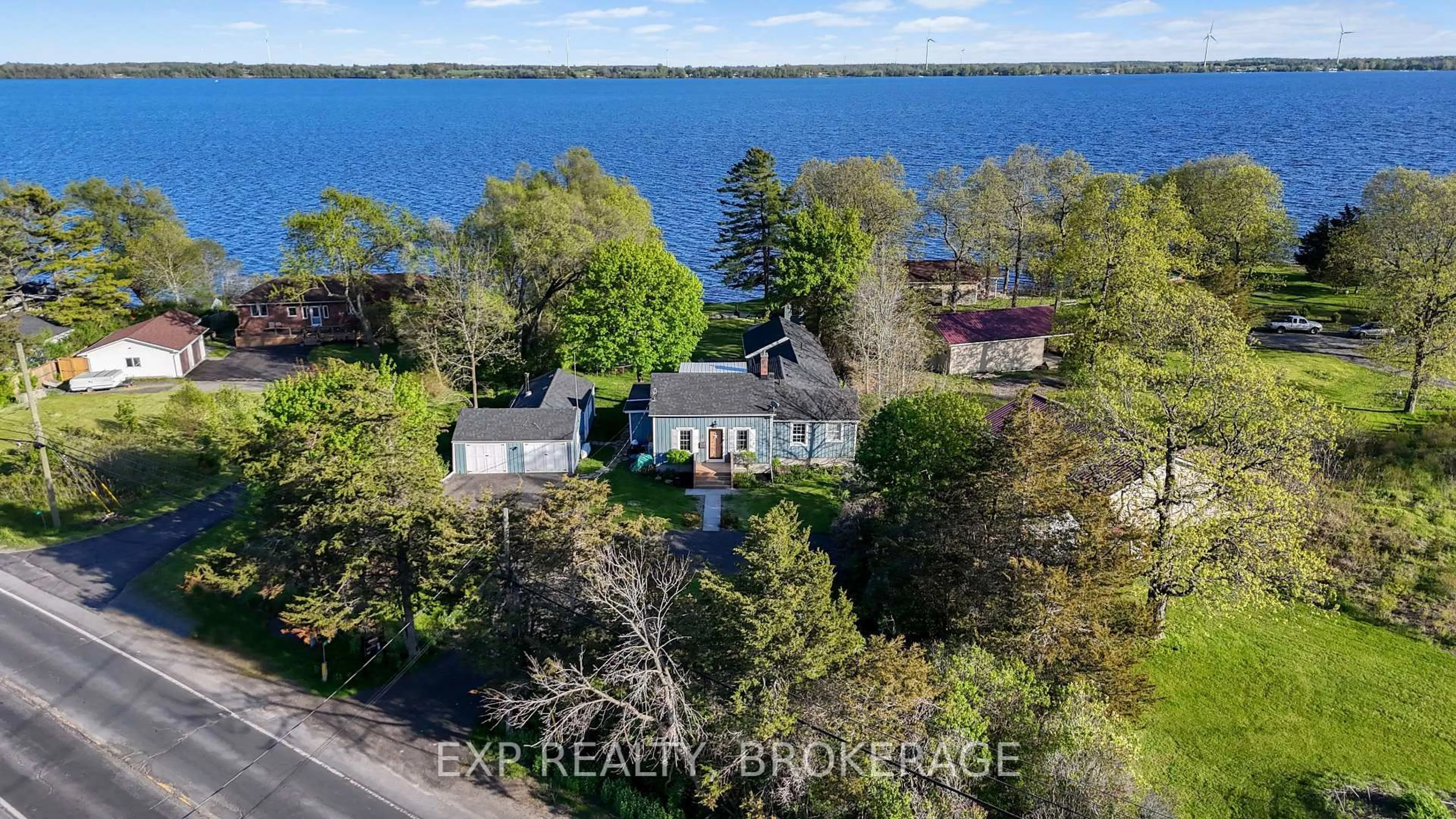 A pic from outside/outdoor area/front of a property/back of a property/a pic from drone, water/lake/river/ocean view for 95 MAIN St, Bath Ontario K0H 1G0