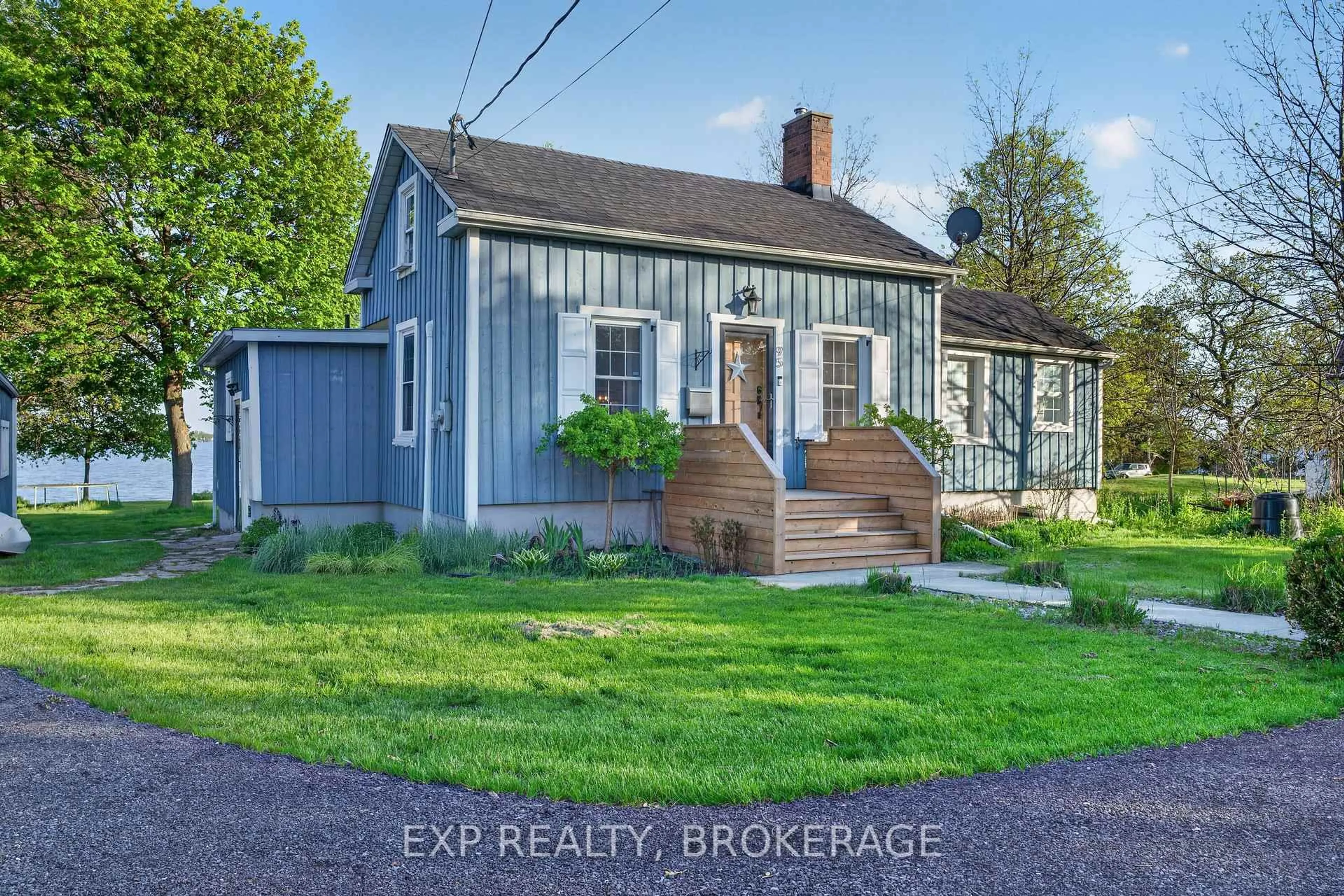 A pic from outside/outdoor area/front of a property/back of a property/a pic from drone, street for 95 MAIN St, Bath Ontario K0H 1G0