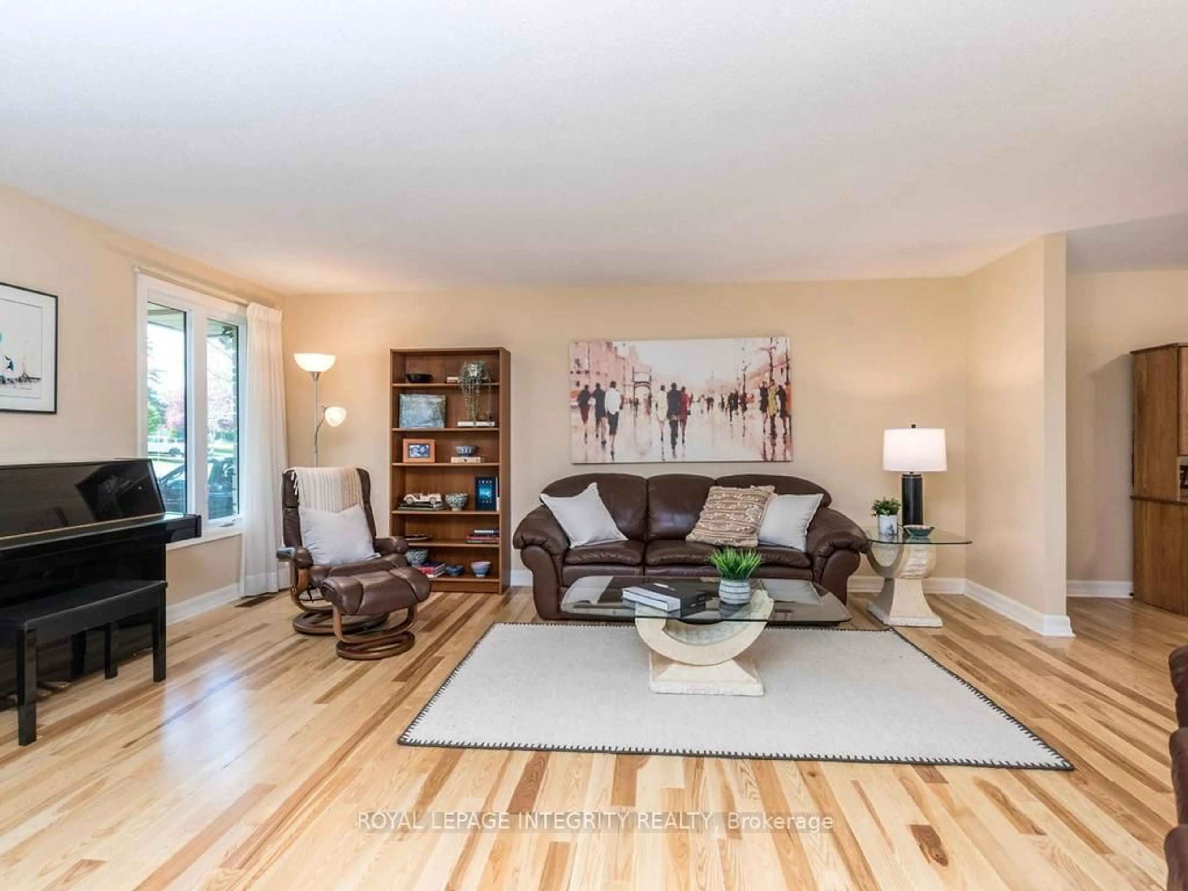 Living room with furniture, wood/laminate floor for 55 Overlake Dr, Ottawa Ontario K2E 5V4
