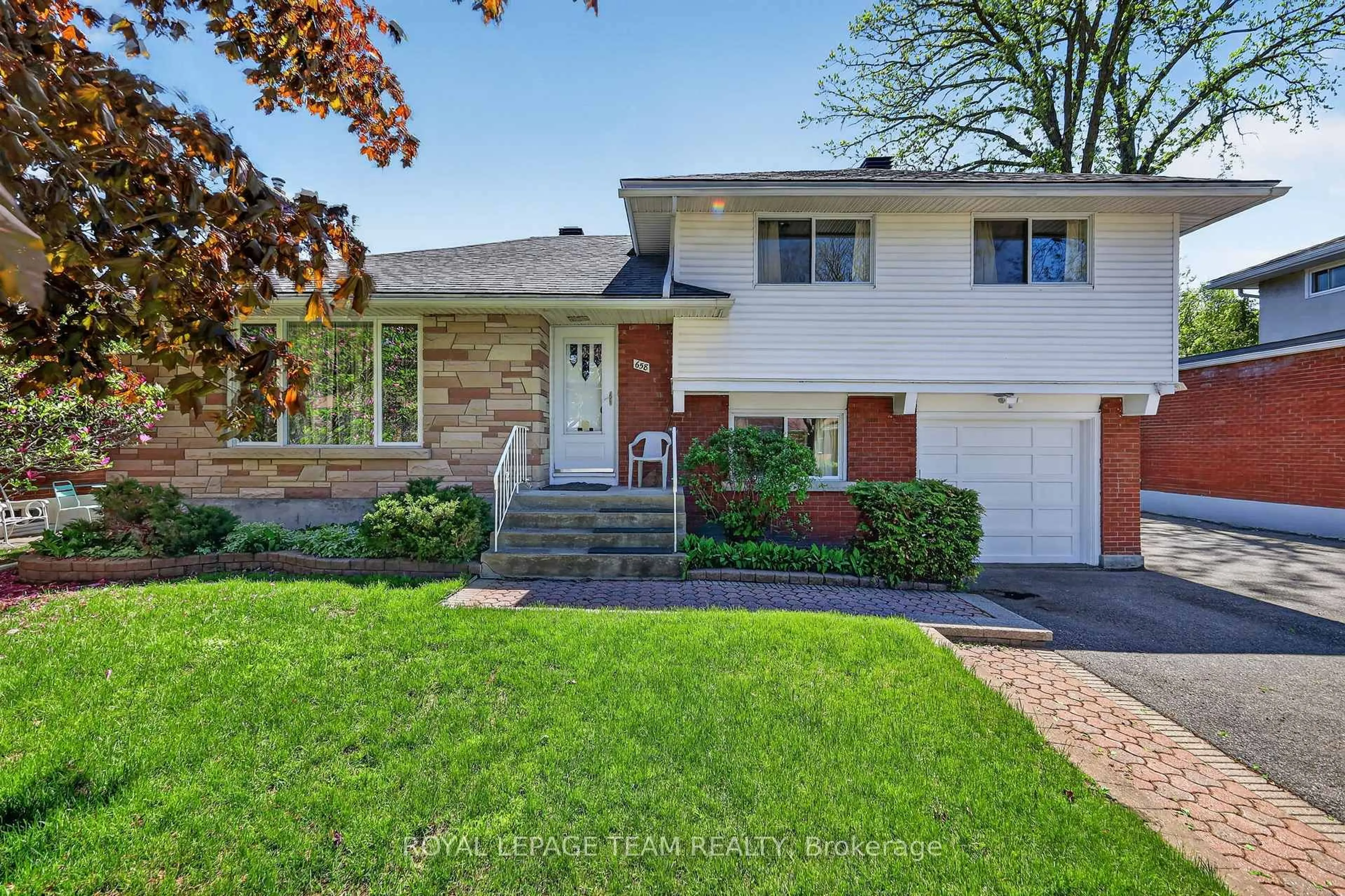 Home with brick exterior material, street for 658 Tillbury Ave, Ottawa Ontario K2A 1A1
