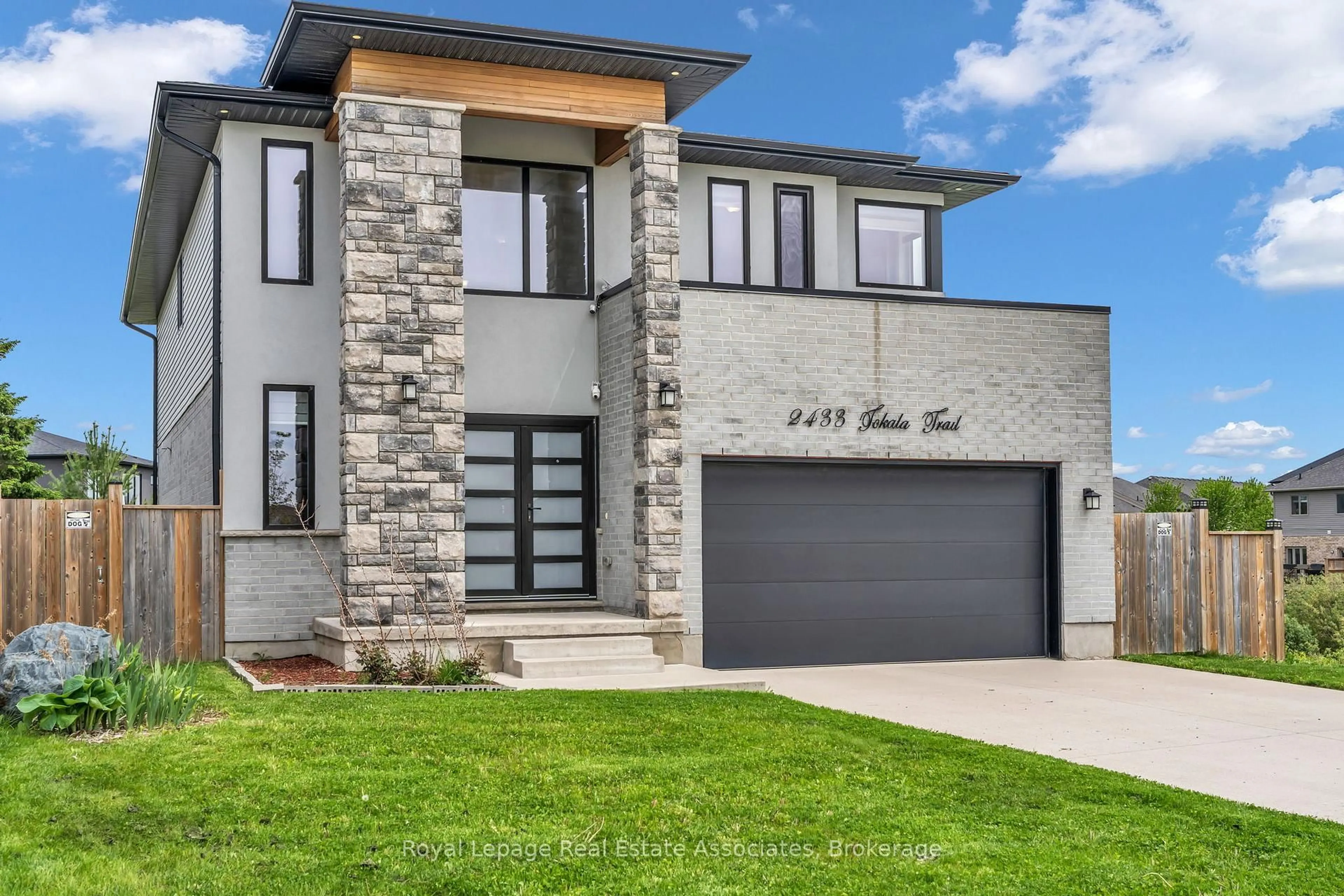 Home with brick exterior material, street for 2433 Tokala Tr, London North Ontario N6G 0V6