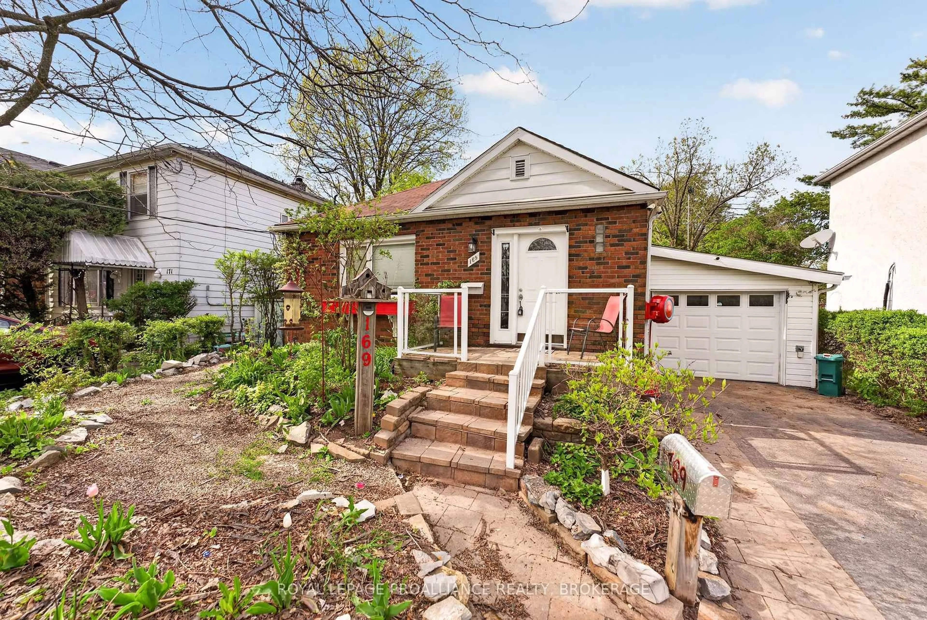 Home with brick exterior material, street for 169 Carruthers Ave, Kingston Ontario K7L 1M8