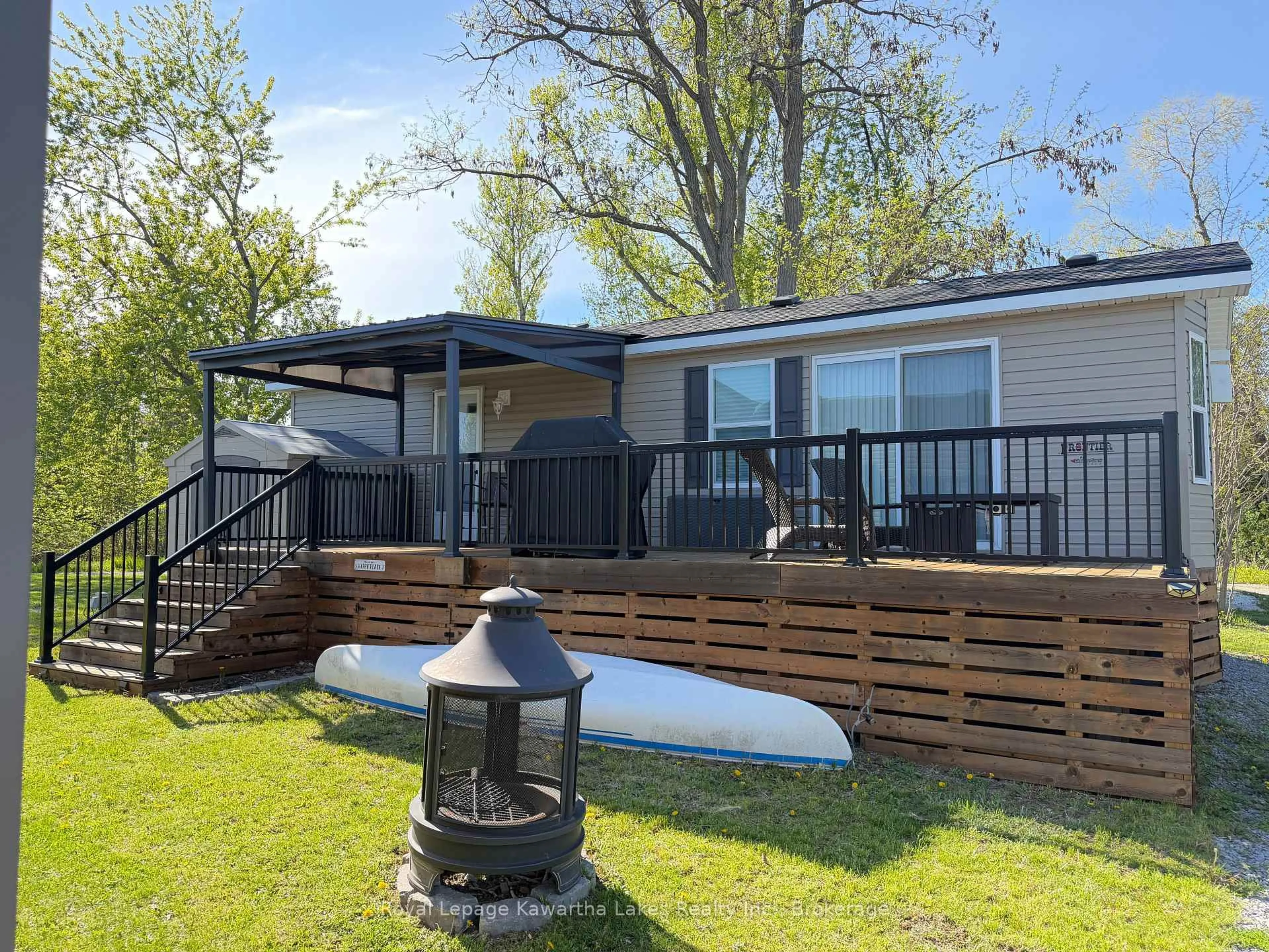 Home with vinyl exterior material, water/lake/river/ocean view for 657 Thunder Bridge Rd #WV18, Kawartha Lakes Ontario K9V 4R1