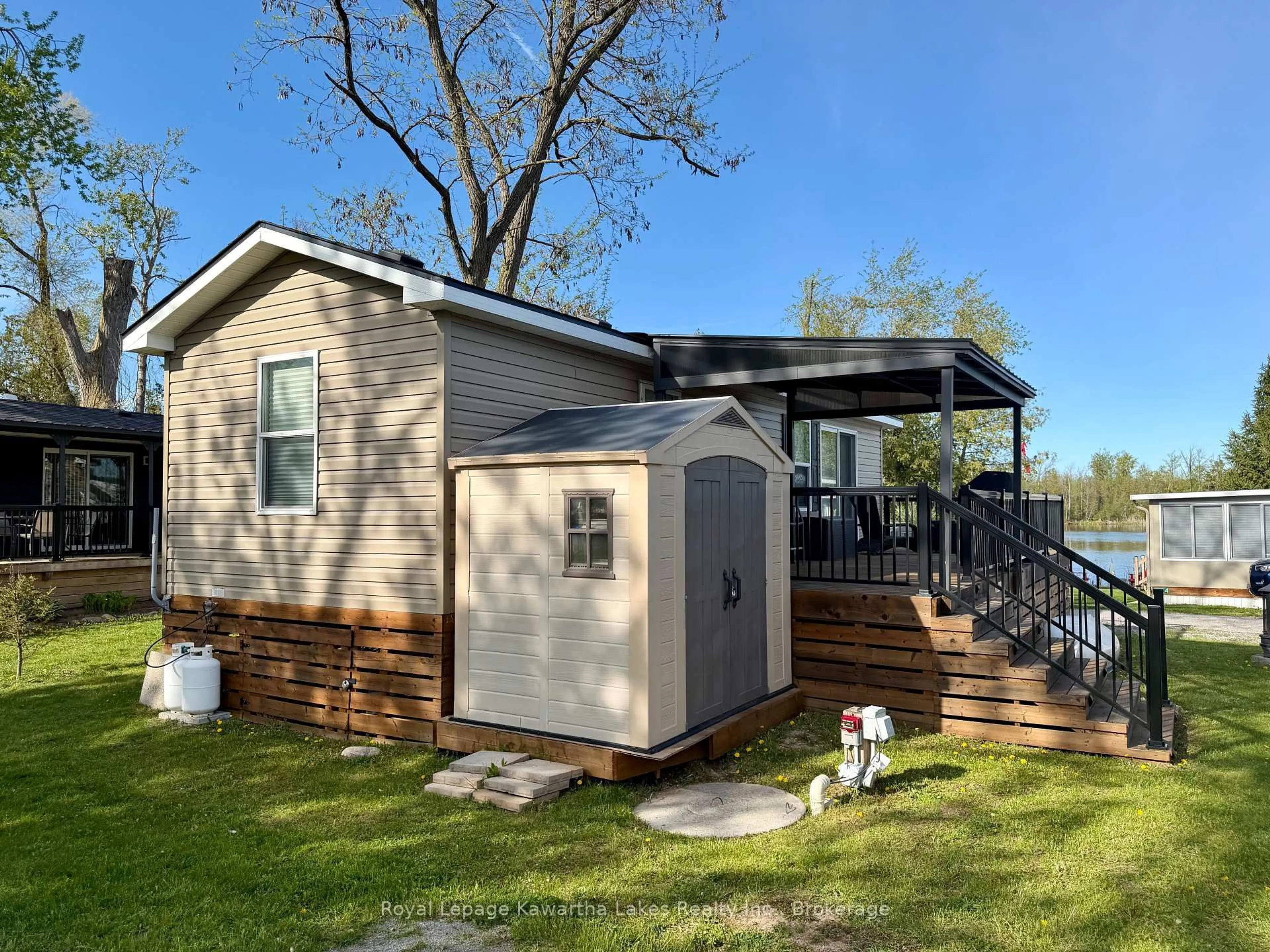 Home with vinyl exterior material, water/lake/river/ocean view for 657 Thunder Bridge Rd #WV18, Kawartha Lakes Ontario K9V 4R1