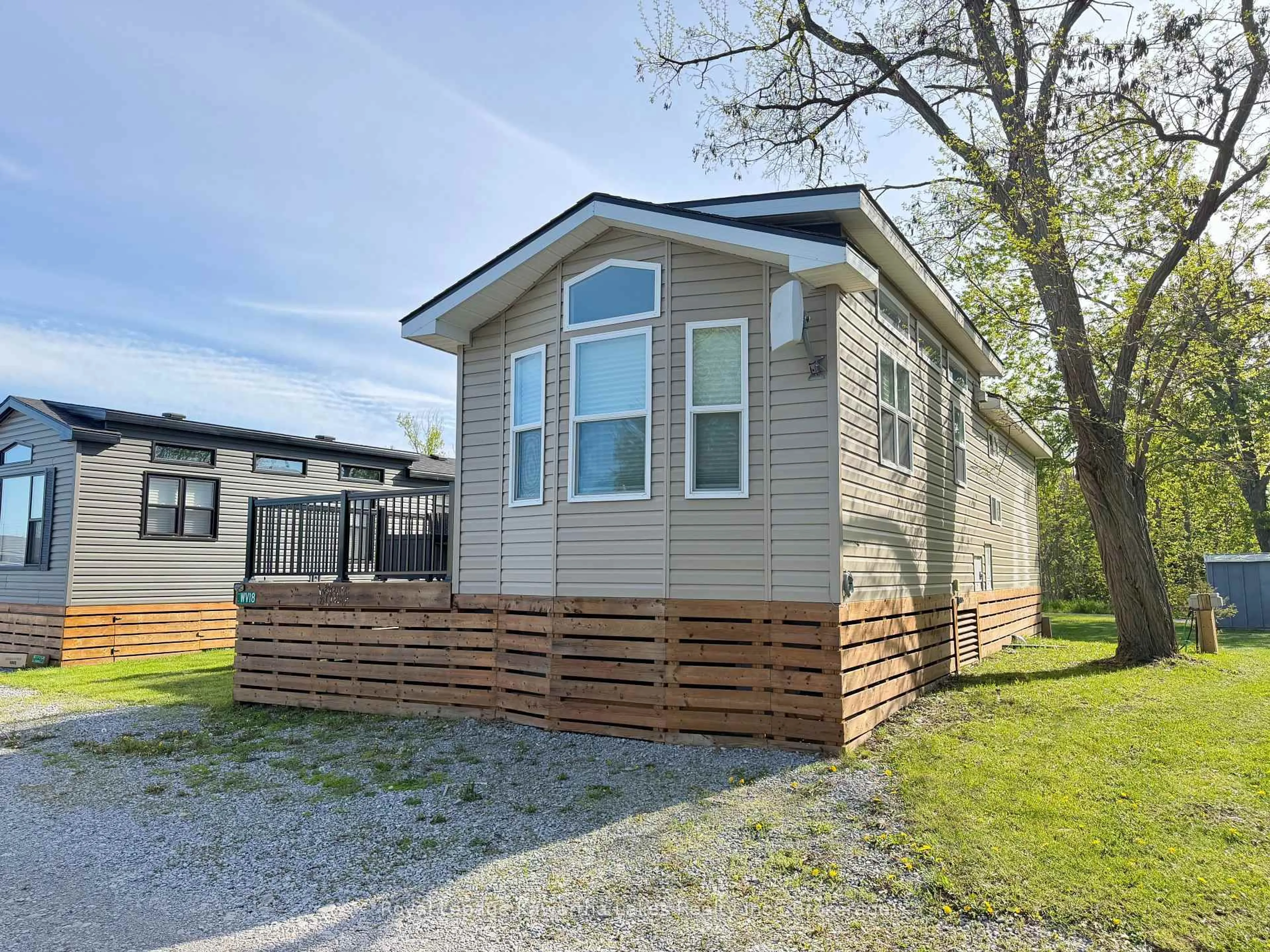 Home with vinyl exterior material, street for 657 Thunder Bridge Rd #WV18, Kawartha Lakes Ontario K9V 4R1