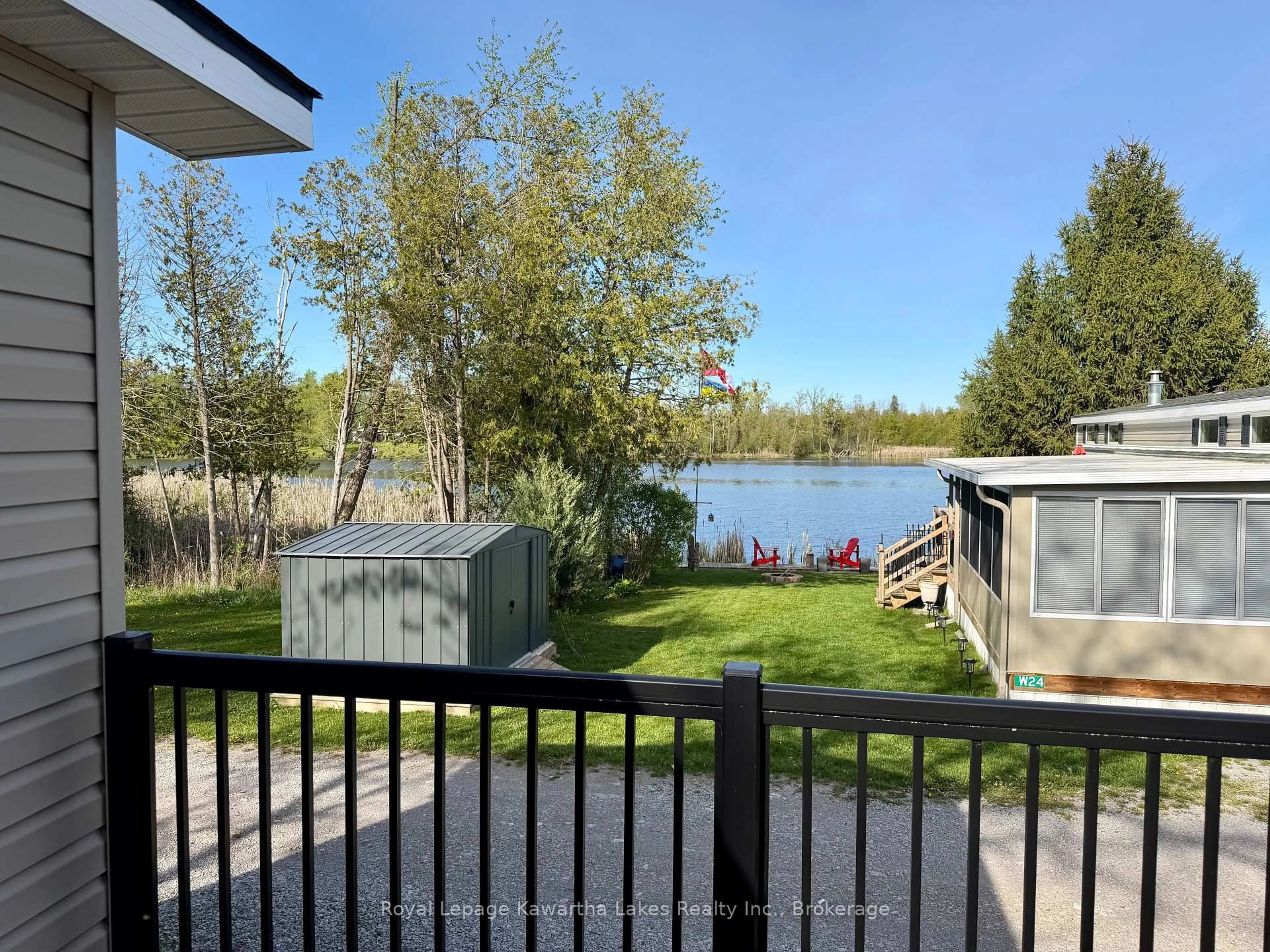 A pic from outside/outdoor area/front of a property/back of a property/a pic from drone, water/lake/river/ocean view for 657 Thunder Bridge Rd #WV18, Kawartha Lakes Ontario K9V 4R1