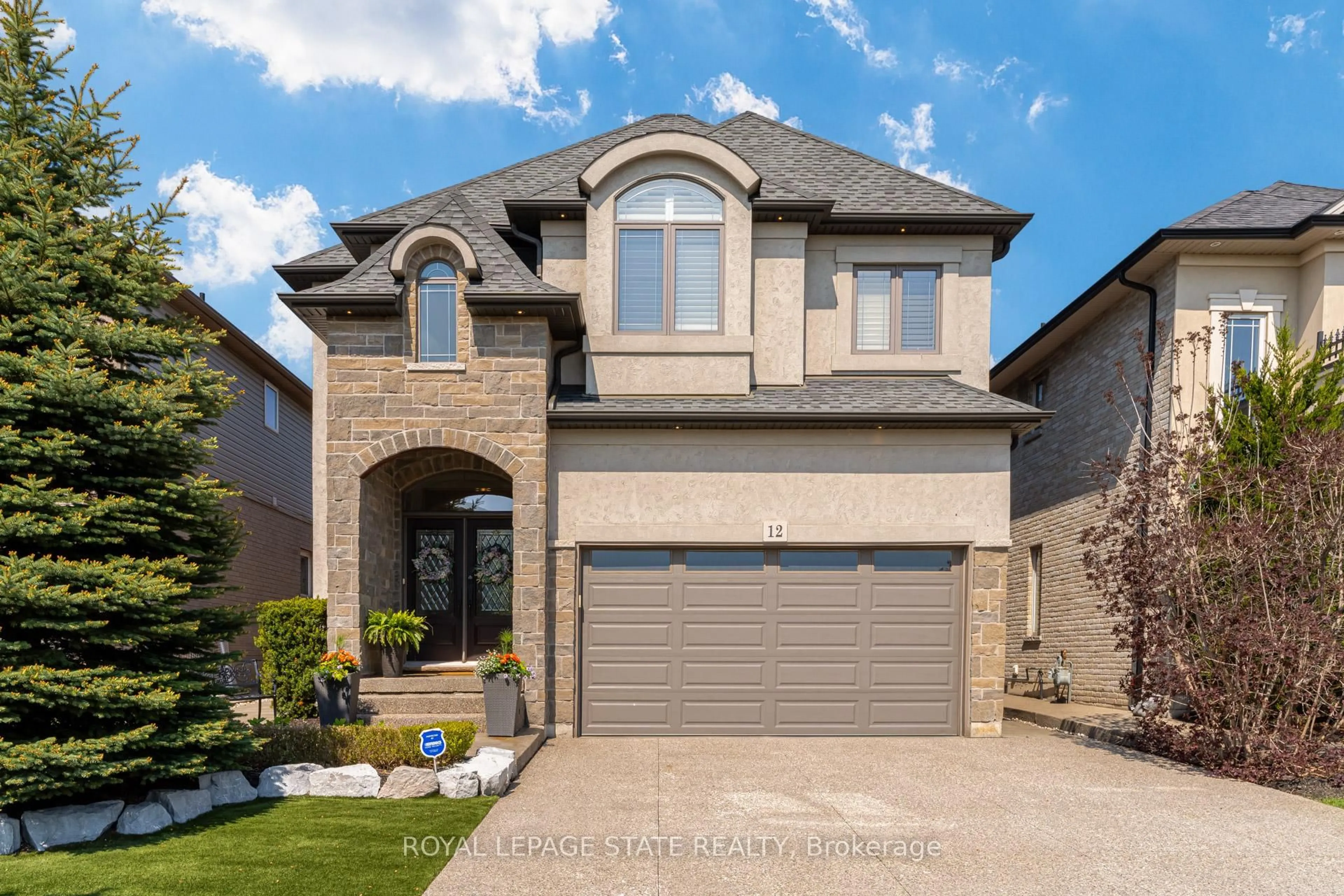 Home with brick exterior material, street for 12 Nicosia Rd, Hamilton Ontario L0R 1W0