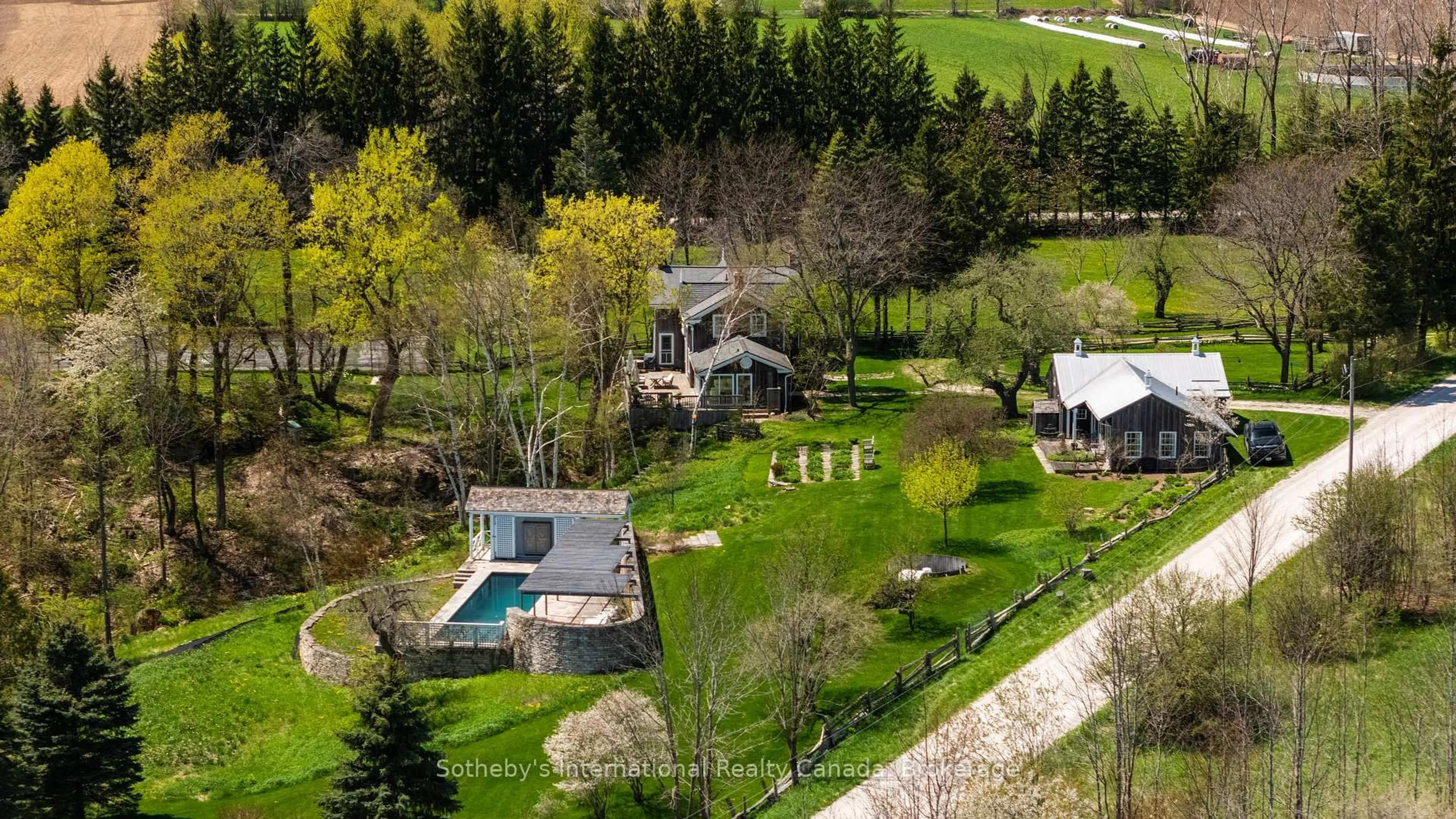 A pic from outside/outdoor area/front of a property/back of a property/a pic from drone, unknown for 47014 Old Mail Rd, Grey Highlands Ontario N4L 1W7