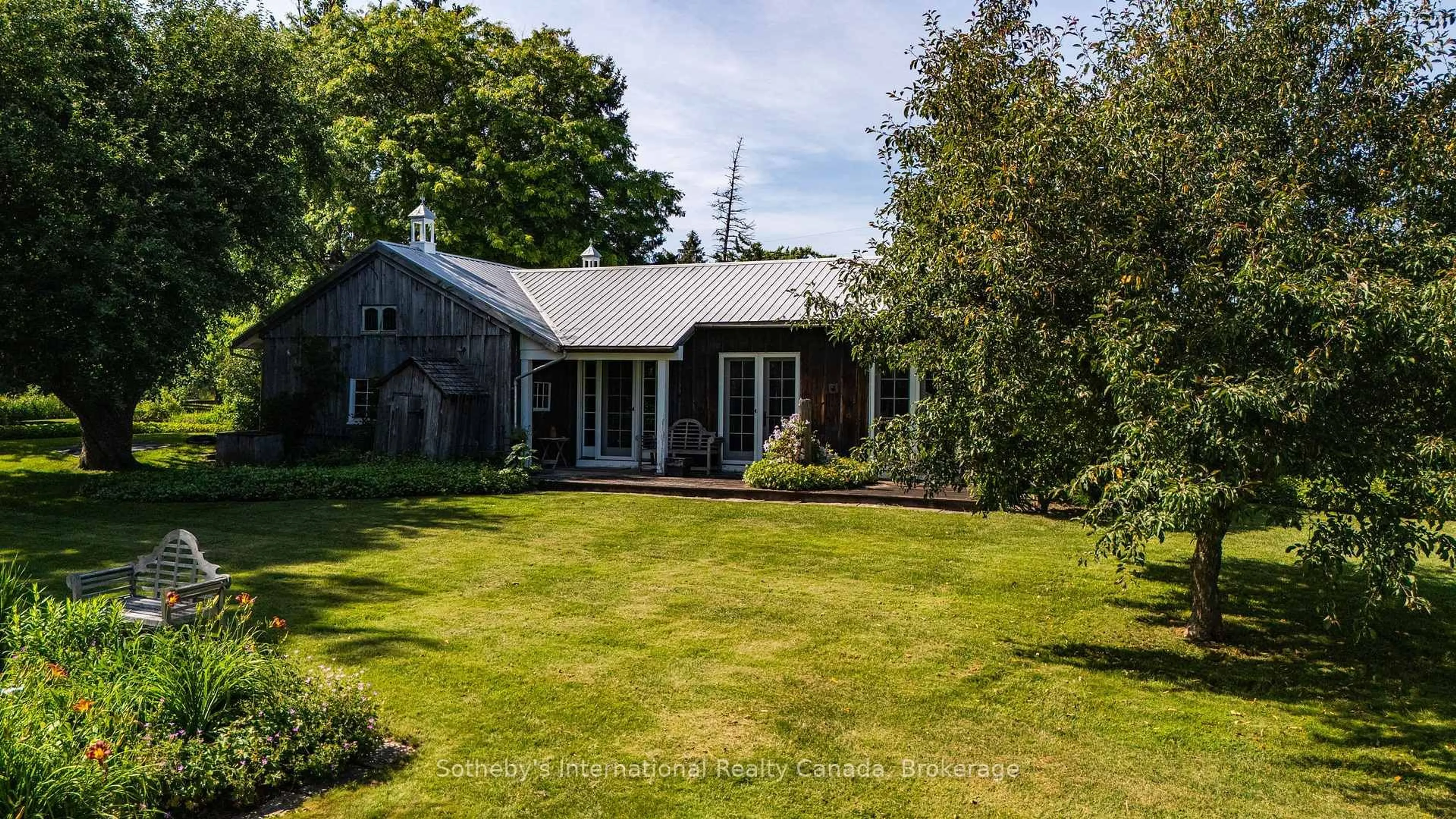 A pic from outside/outdoor area/front of a property/back of a property/a pic from drone, street for 47014 Old Mail Rd, Grey Highlands Ontario N4L 1W7