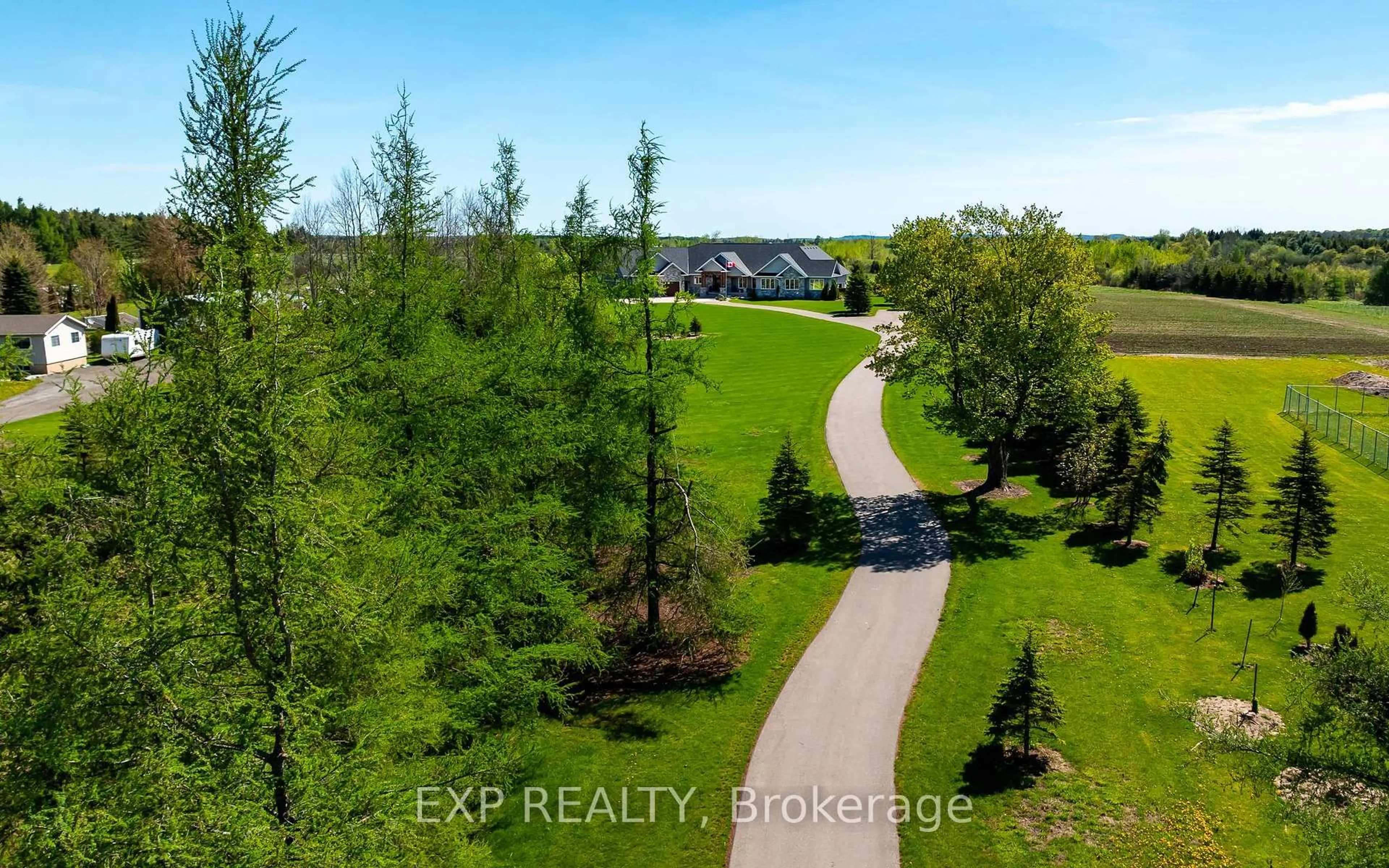 A pic from outside/outdoor area/front of a property/back of a property/a pic from drone, forest/trees view for 473449 County Rd 11, Amaranth Ontario L9W 0R3