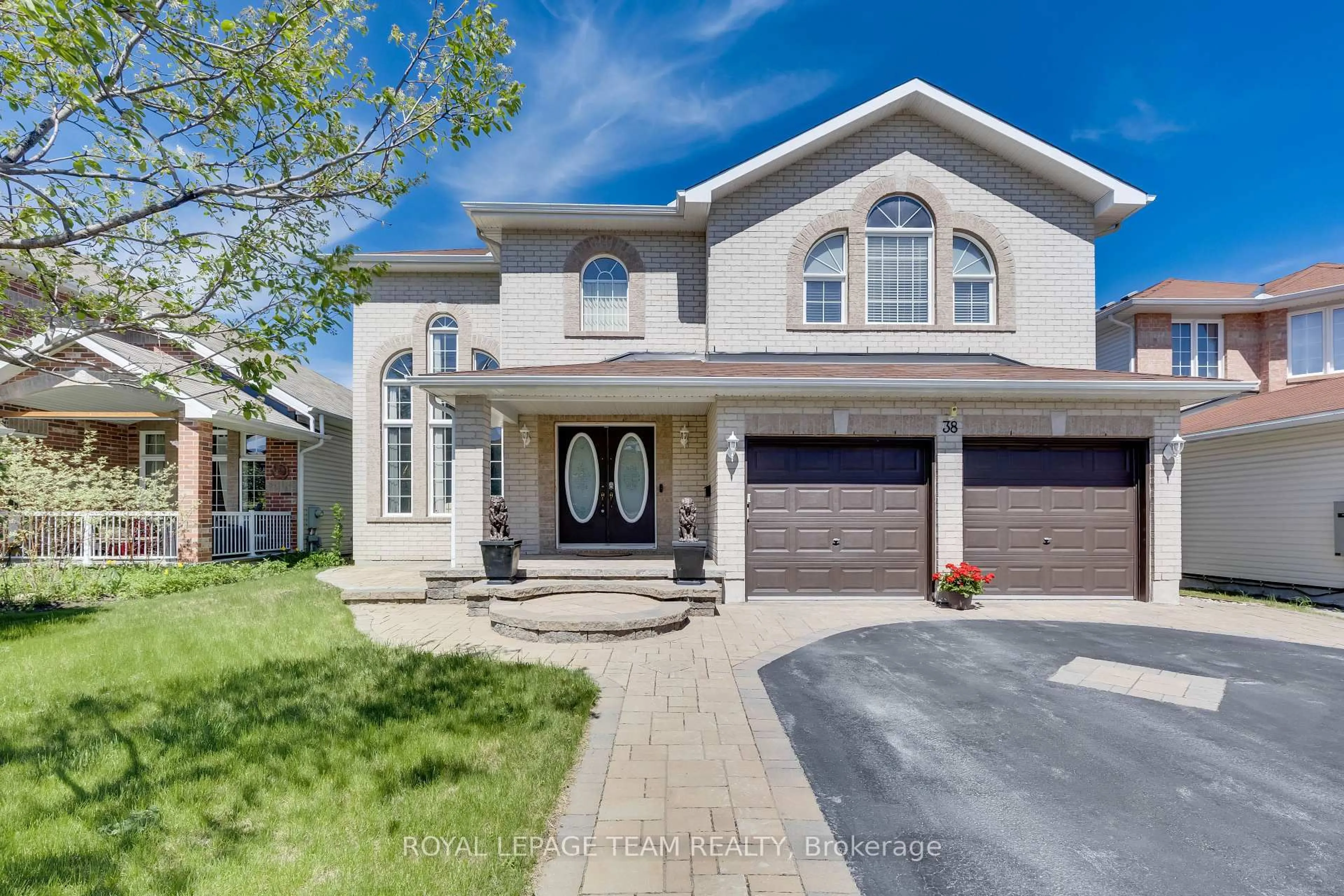 Home with brick exterior material, street for 38 Penrith St, Ottawa Ontario K2W 1E5