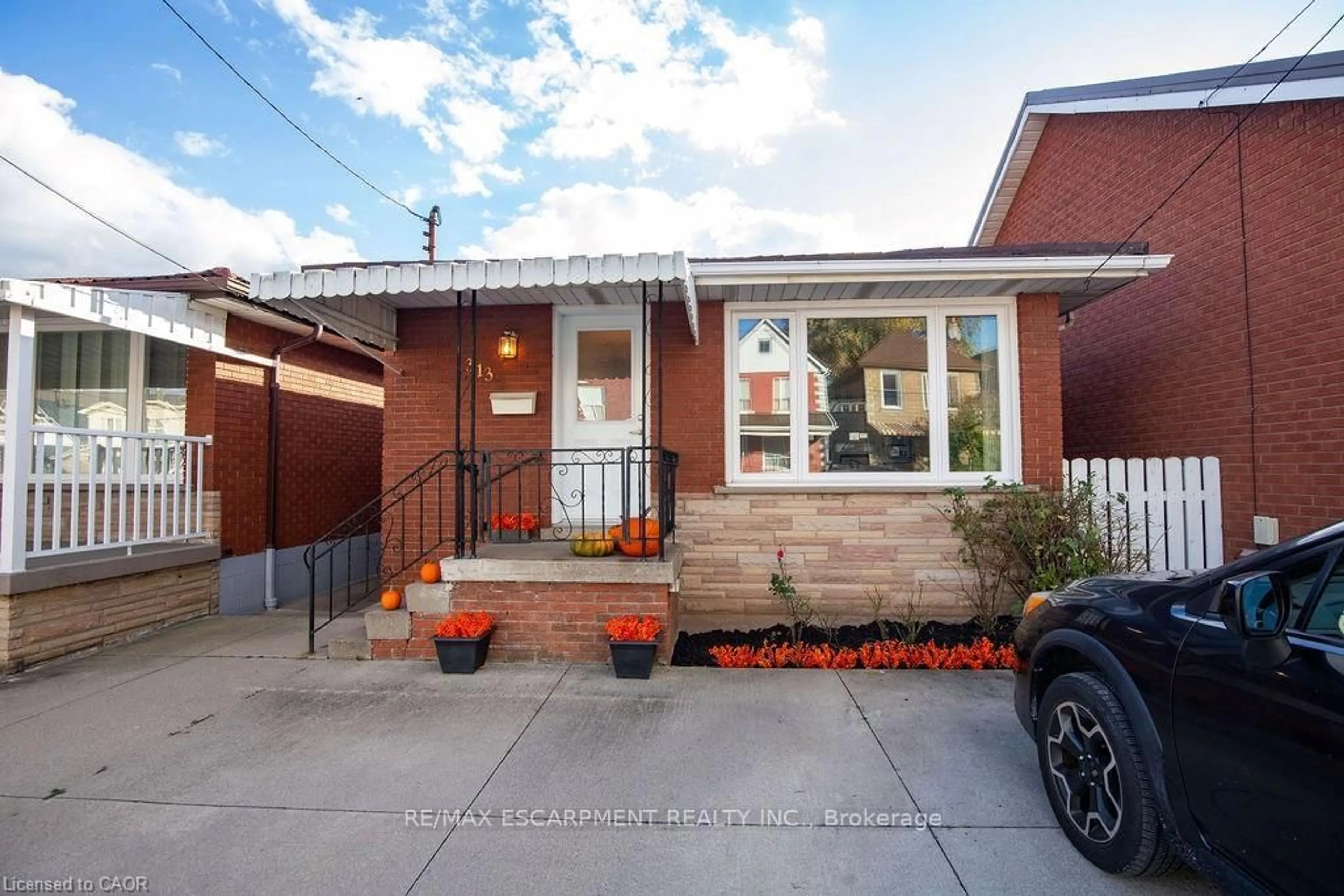 Home with brick exterior material, street for 313 Barton St, Hamilton Ontario L8R 2J3