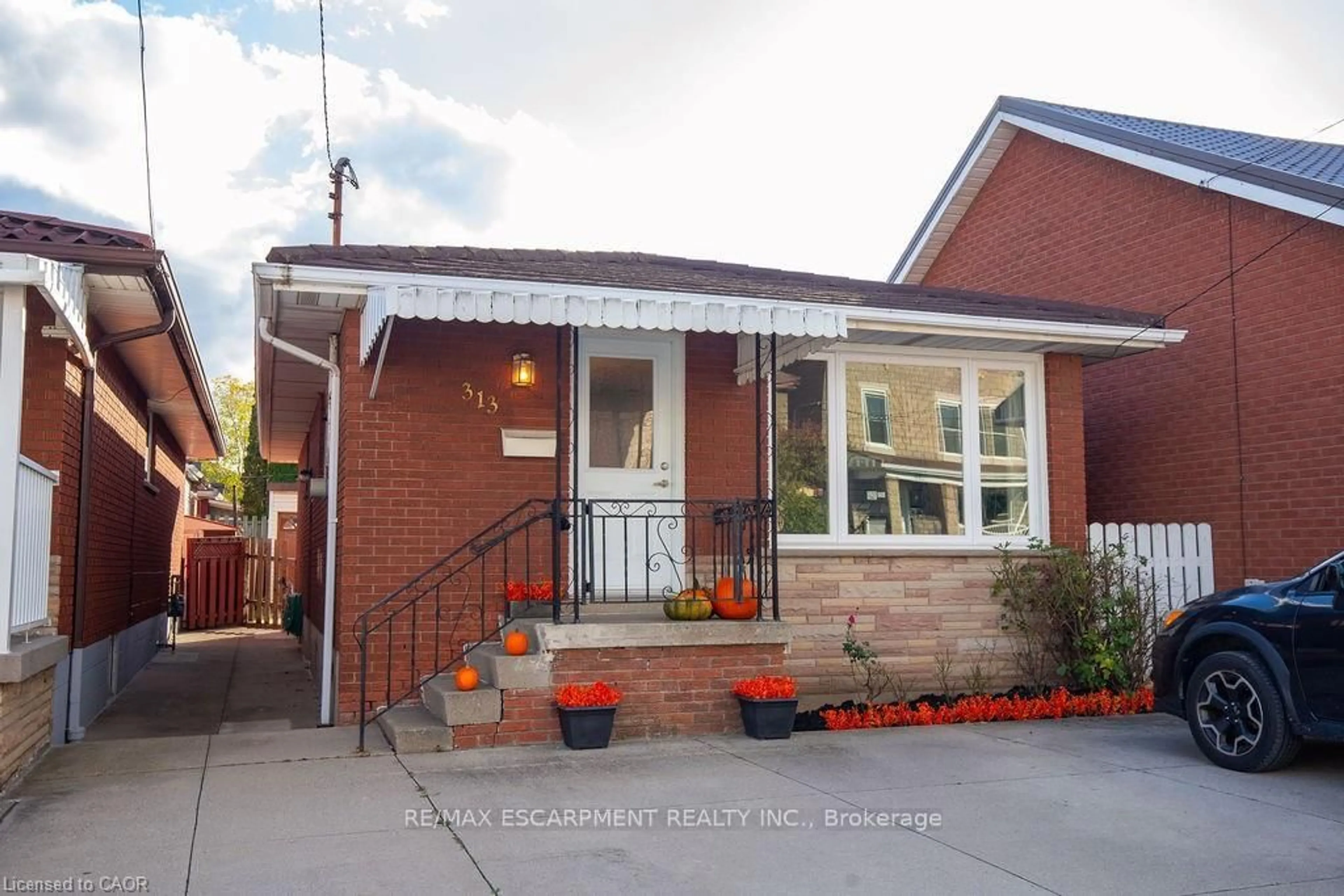 Home with brick exterior material, street for 313 Barton St, Hamilton Ontario L8R 2J3
