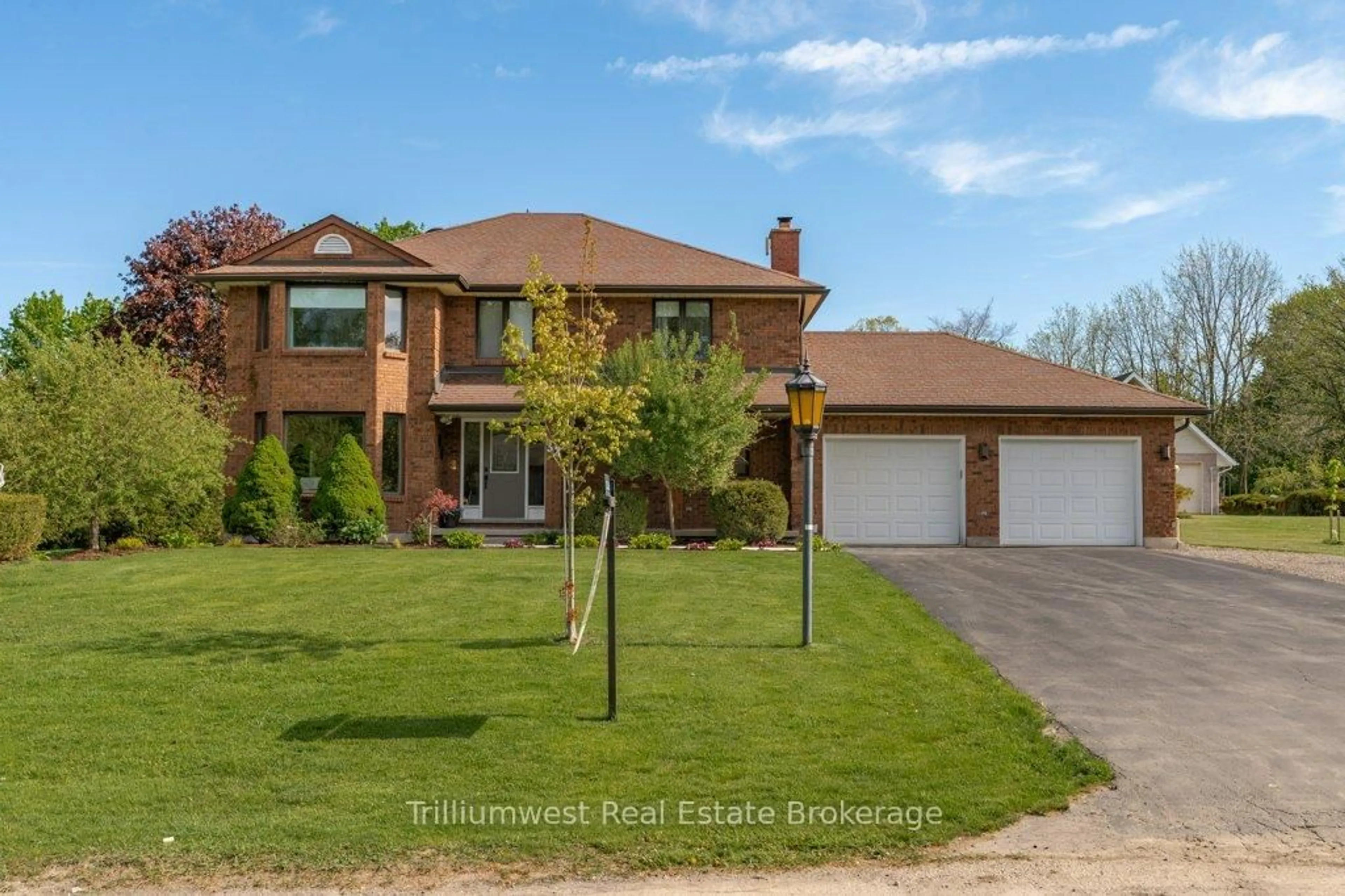 Home with brick exterior material, street for 32 Sunset Dr, Woolwich Ontario N0B 2V0