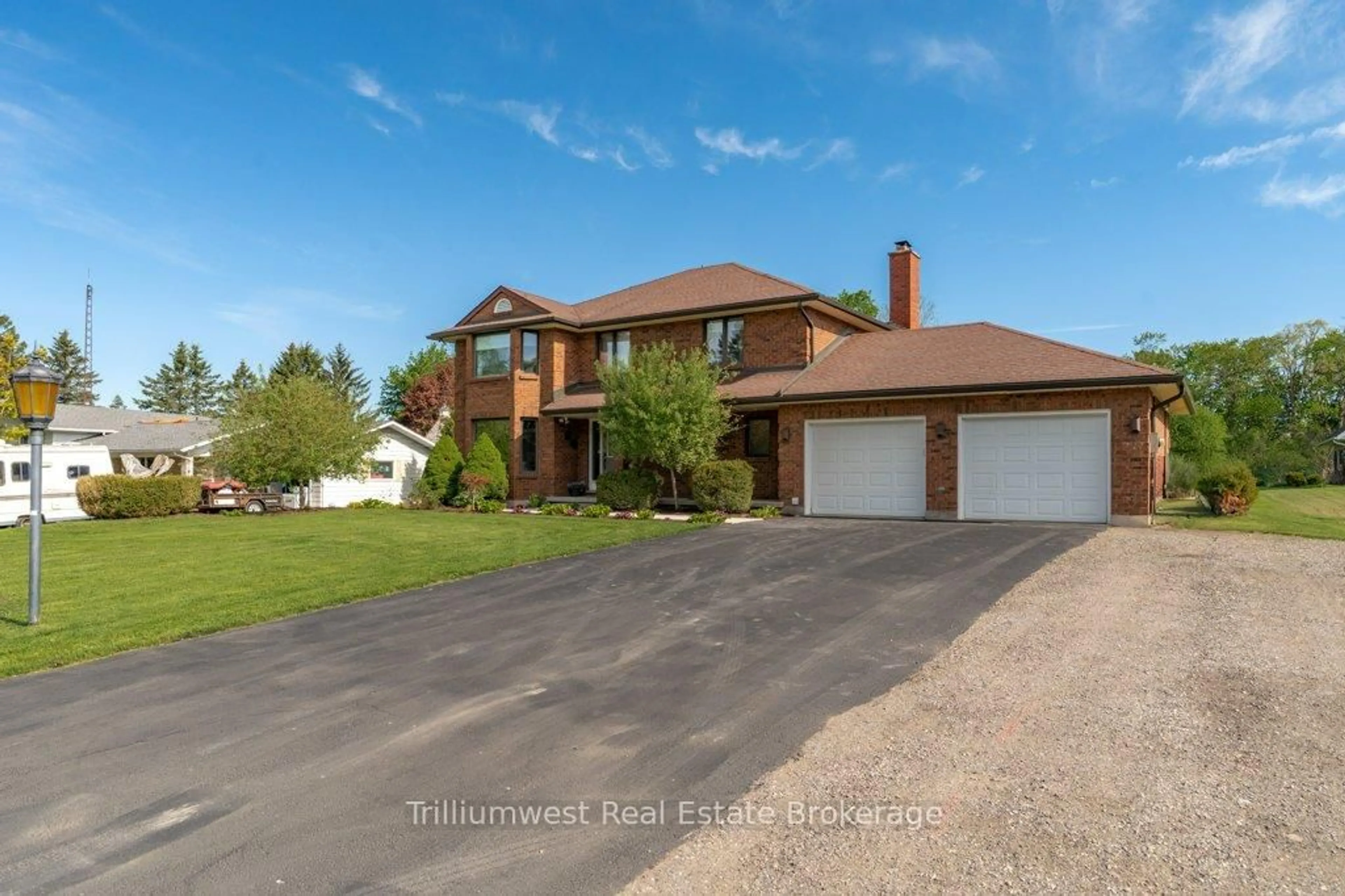 Home with brick exterior material, street for 32 Sunset Dr, Woolwich Ontario N0B 2V0