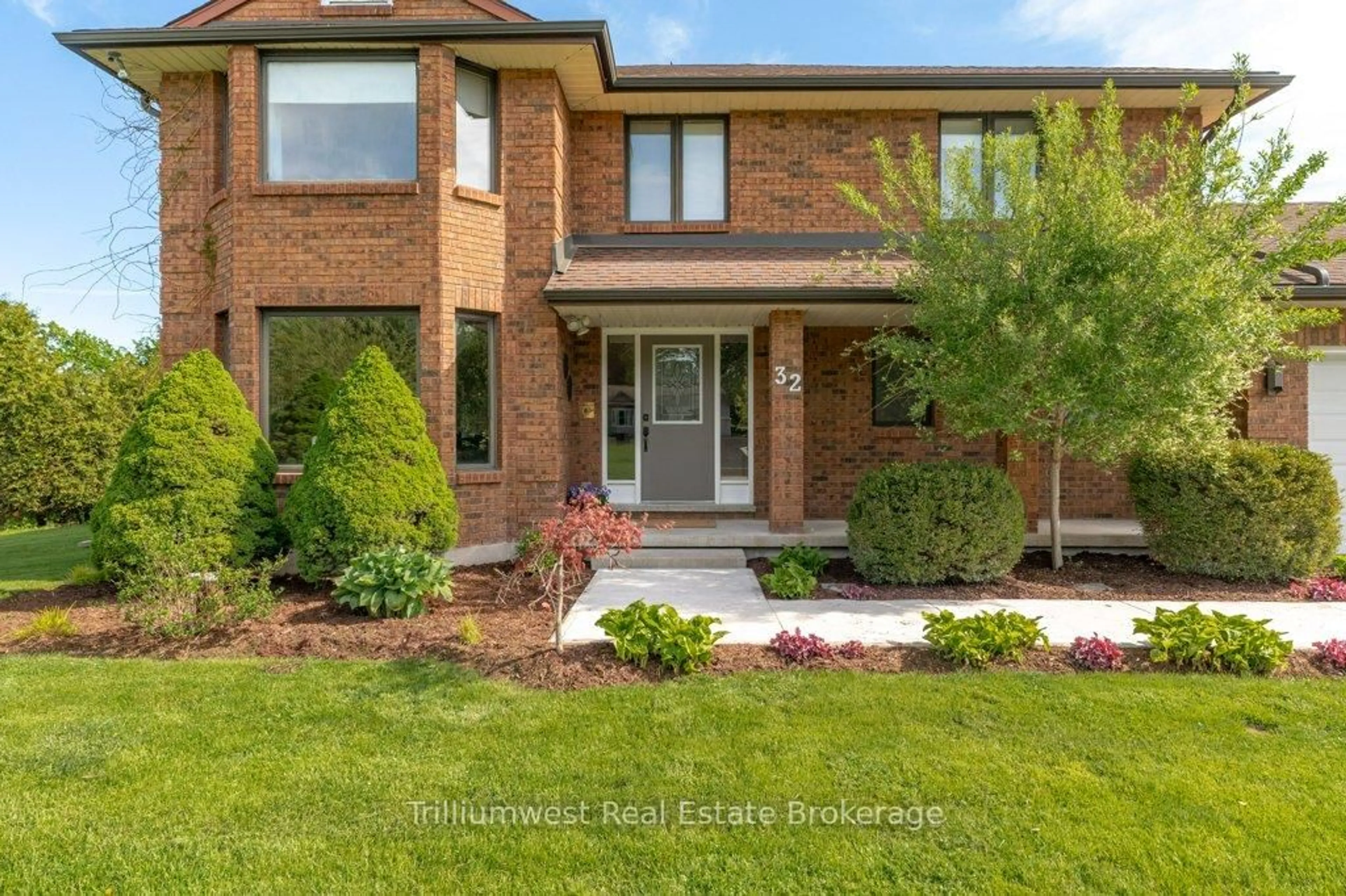 Home with brick exterior material, street for 32 Sunset Dr, Woolwich Ontario N0B 2V0