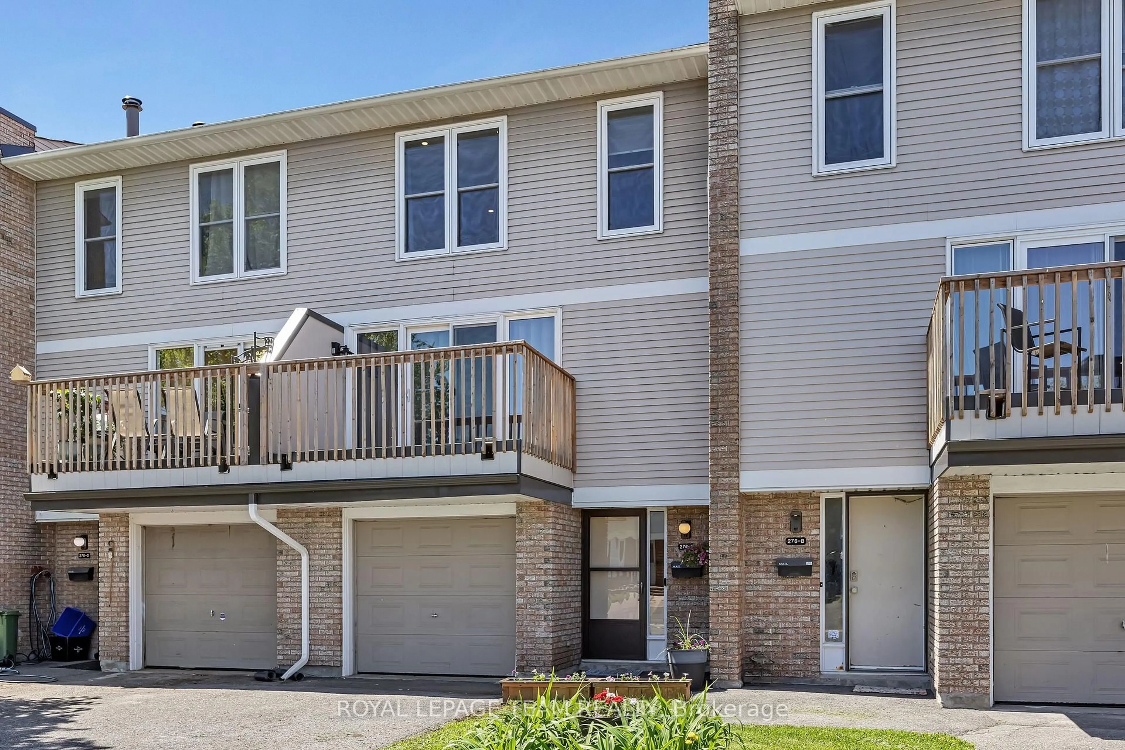 Home with vinyl exterior material, street for 276 Dalehurst Dr #C, Ottawa Ontario K2G 4J5