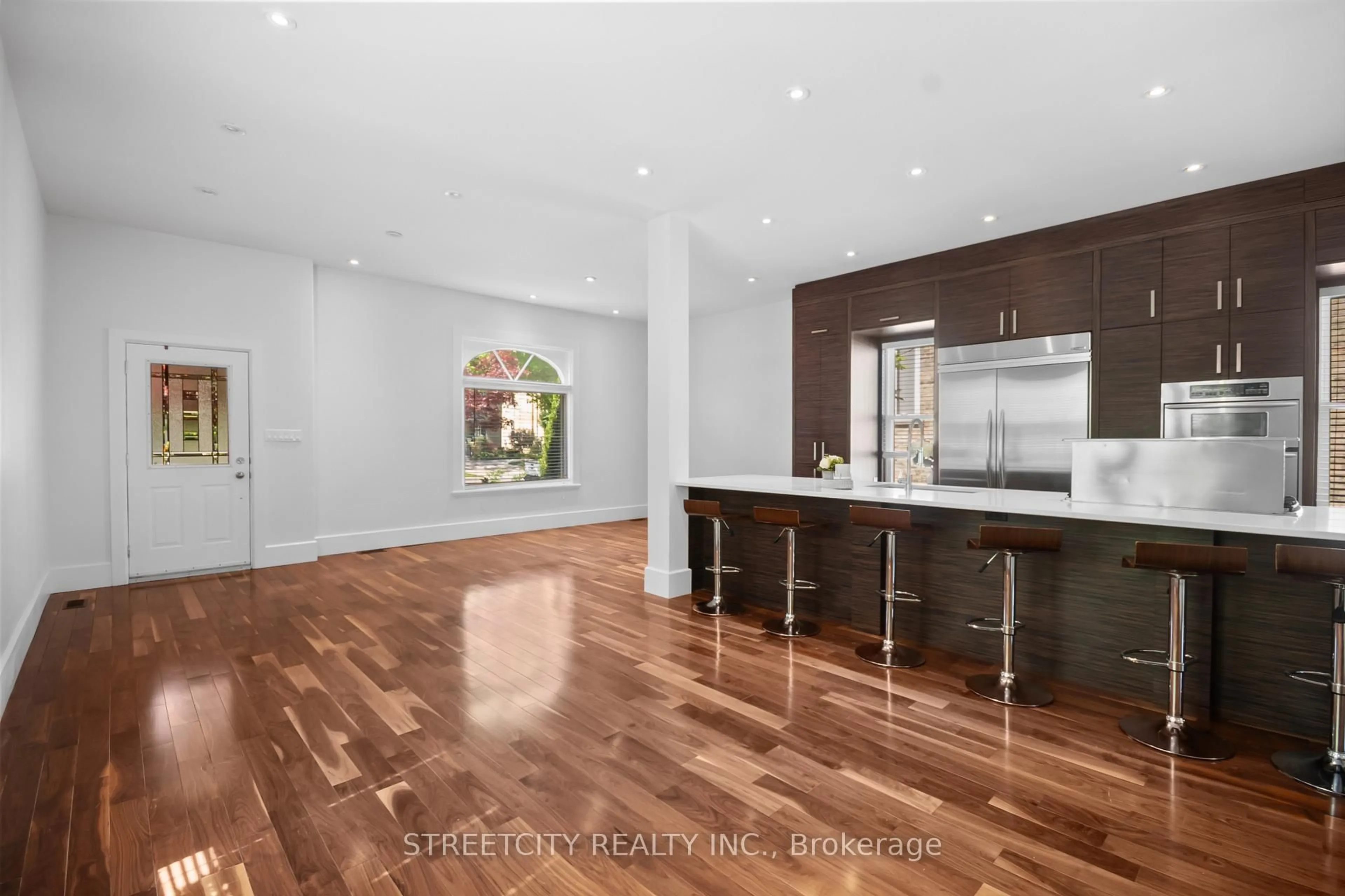 Open concept kitchen, wood/laminate floor for 455 St James St, London East Ontario N5Y 3P2