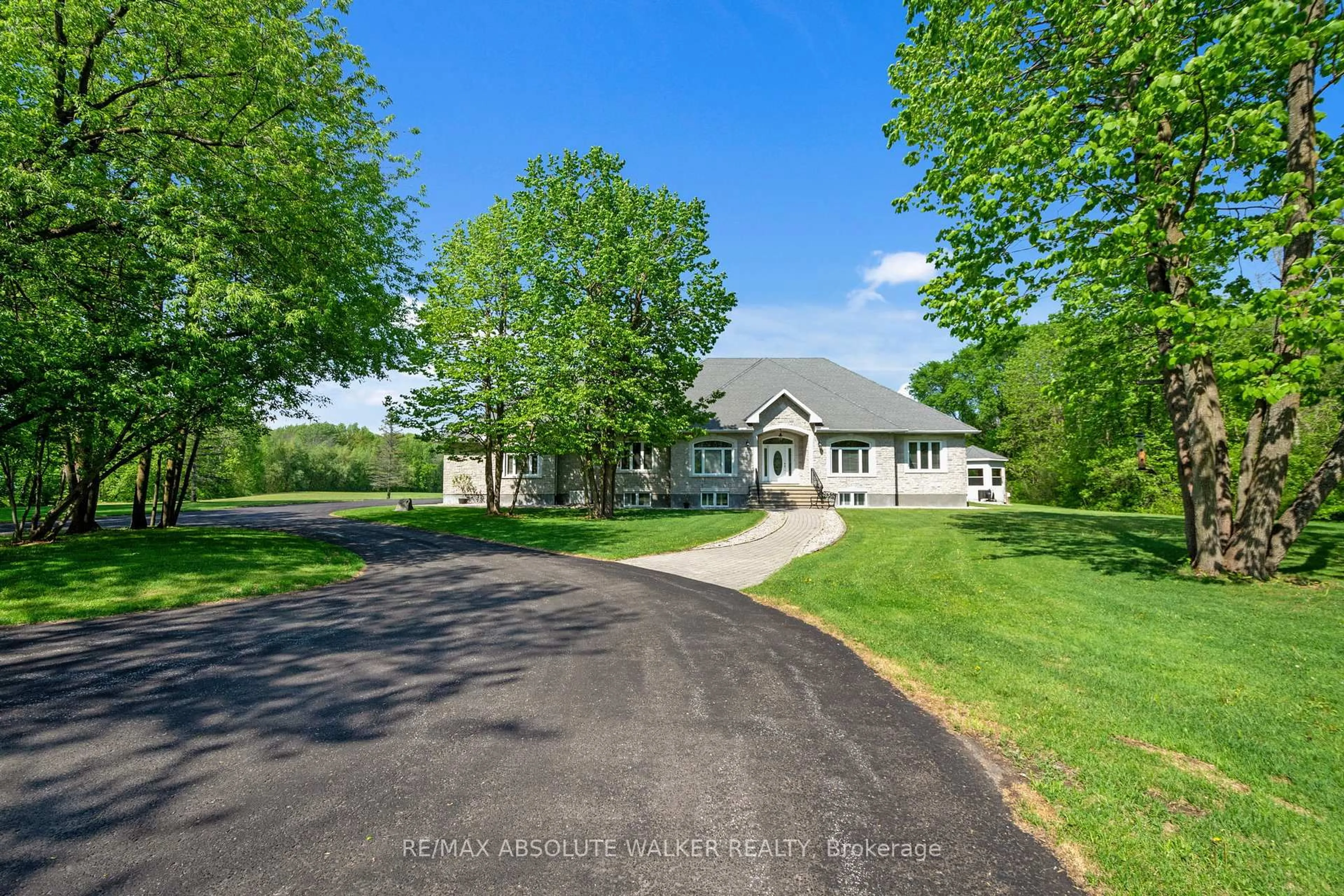 A pic from outside/outdoor area/front of a property/back of a property/a pic from drone, water/lake/river/ocean view for 2501 Kearns Way, Greely Ontario K4P 1R9