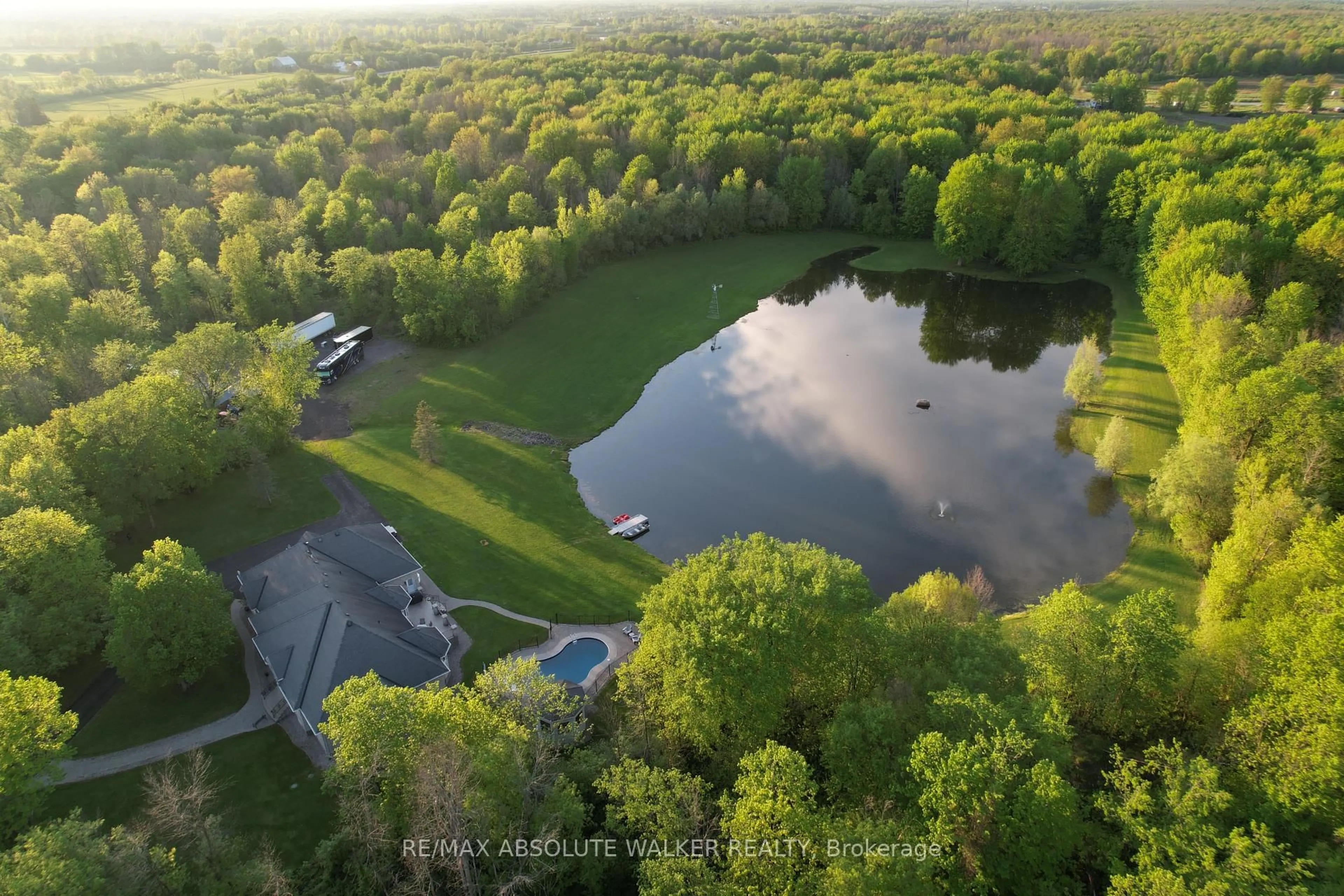 A pic from outside/outdoor area/front of a property/back of a property/a pic from drone, water/lake/river/ocean view for 2501 Kearns Way, Greely Ontario K4P 1R9