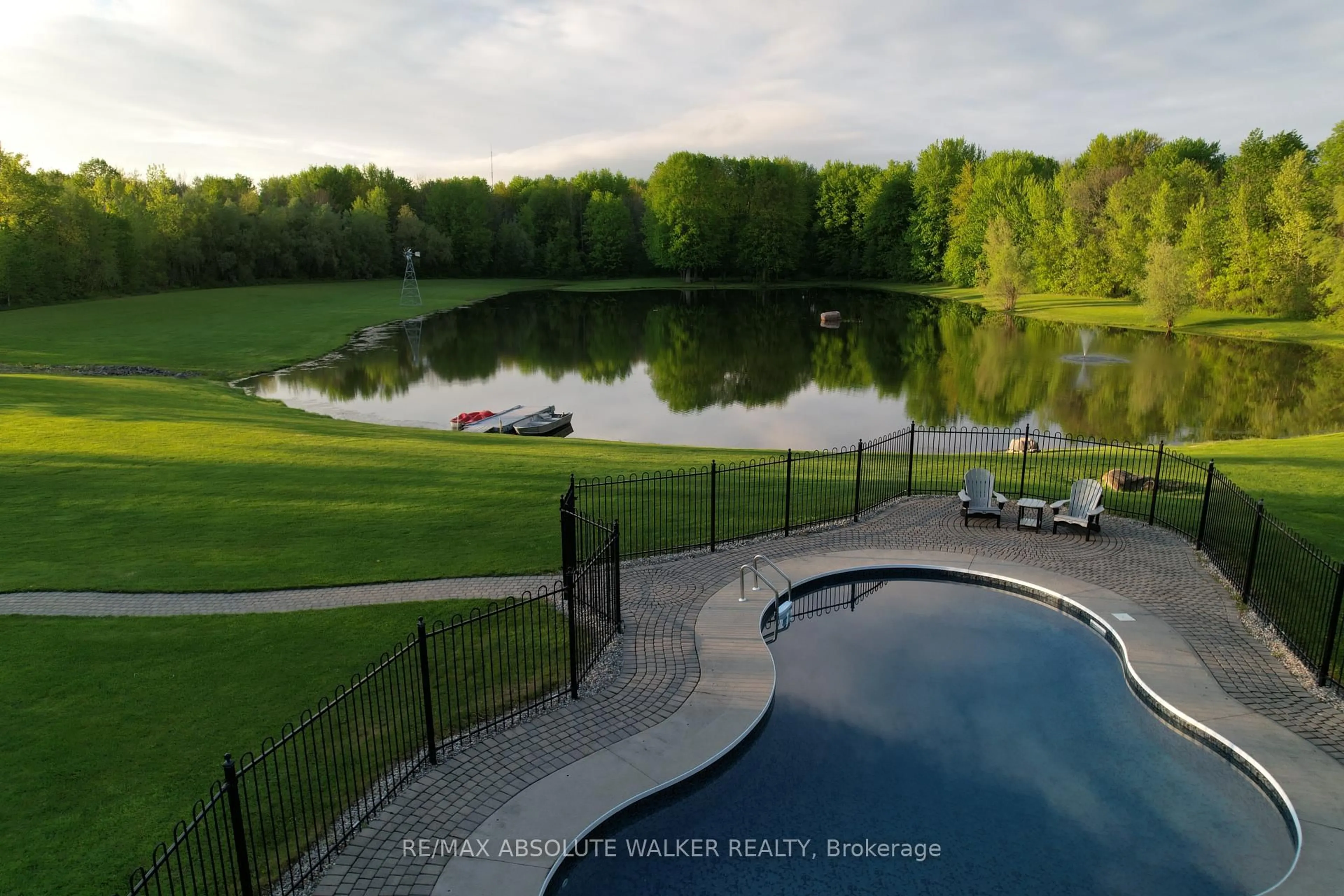 A pic from outside/outdoor area/front of a property/back of a property/a pic from drone, water/lake/river/ocean view for 2501 Kearns Way, Greely Ontario K4P 1R9