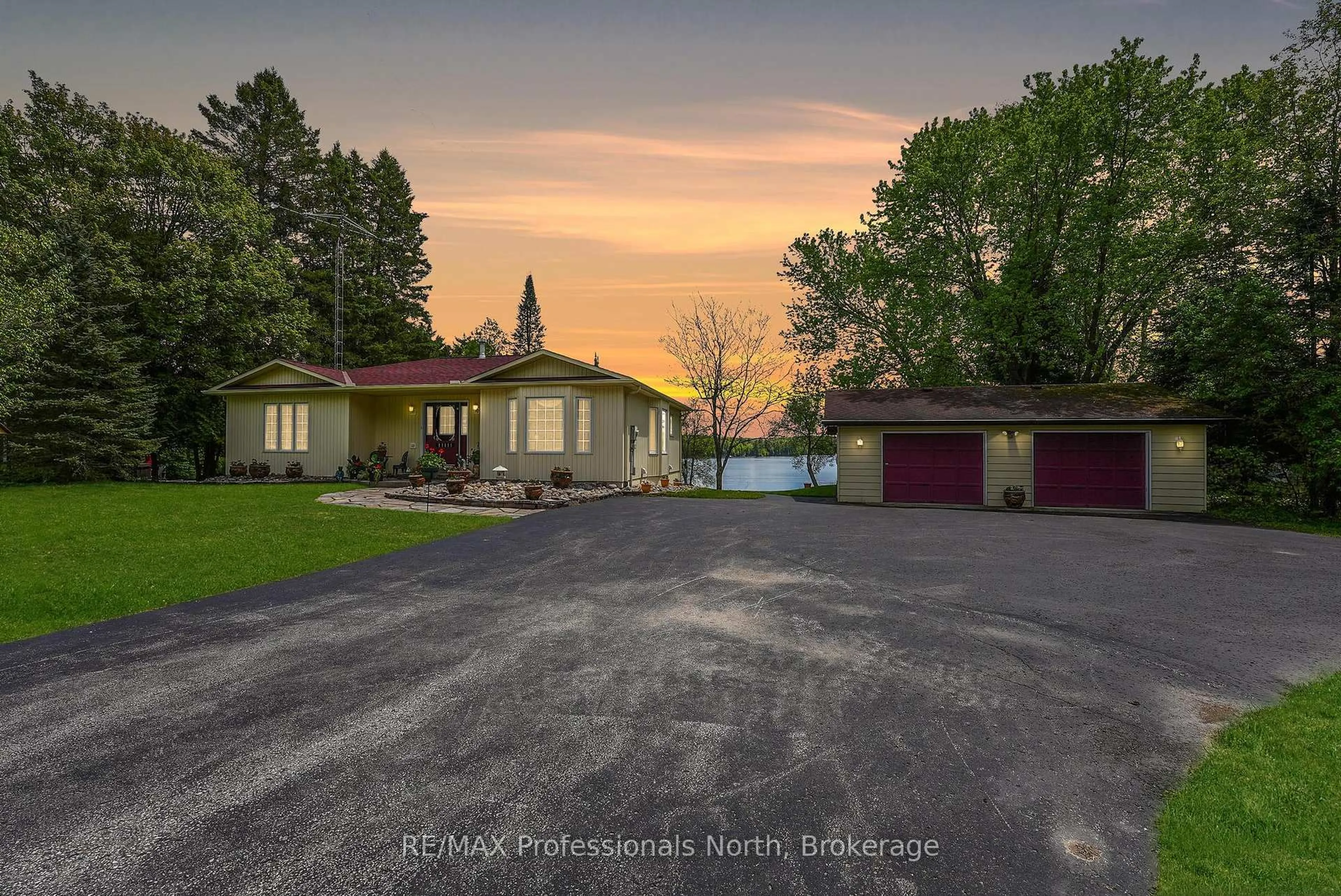 A pic from outside/outdoor area/front of a property/back of a property/a pic from drone, street for 4696 County Road 21, Dysart et al Ontario K0M 1S0