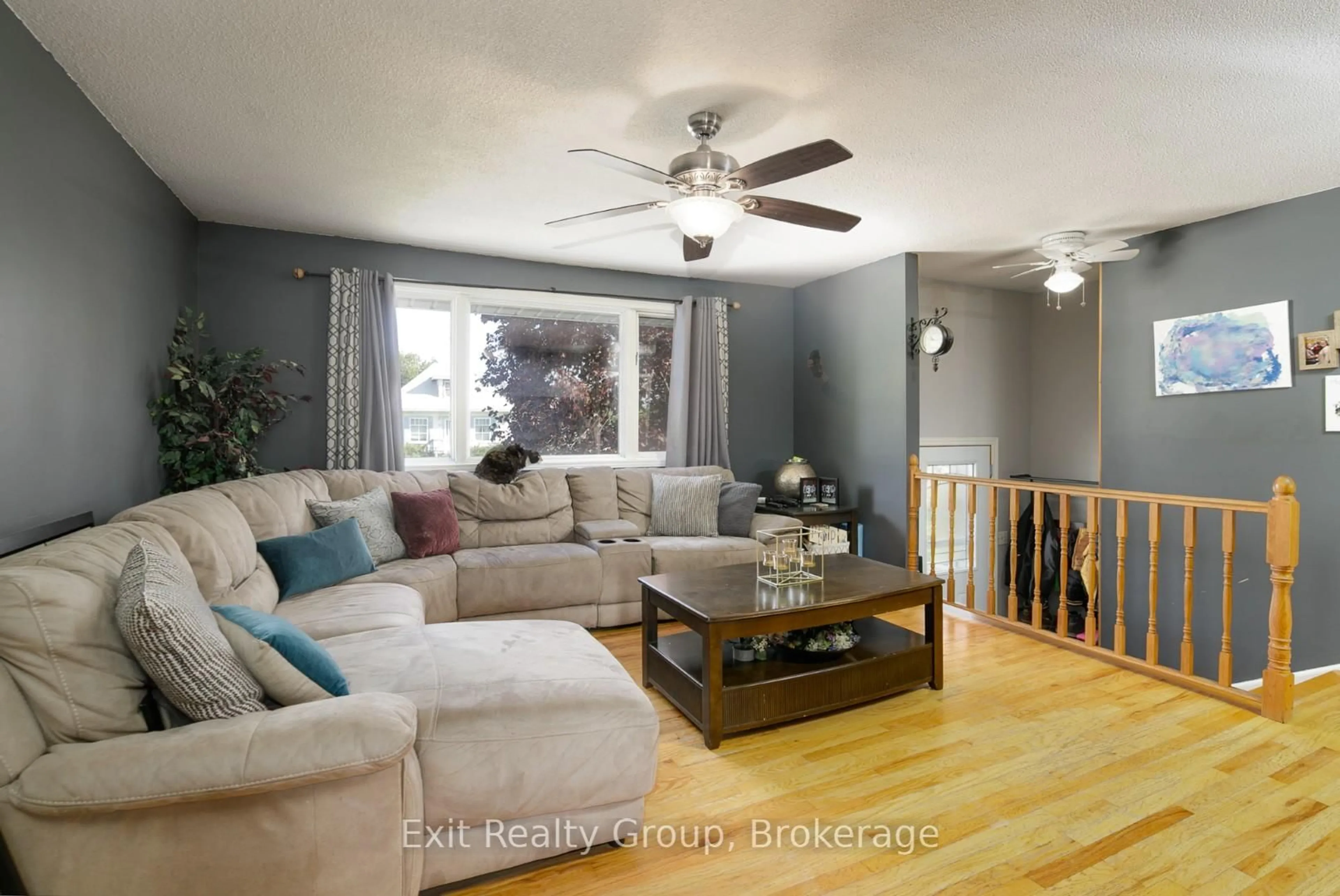 Living room with furniture, wood/laminate floor for 13 Huffman Rd, Hastings Ontario K0K 2C0