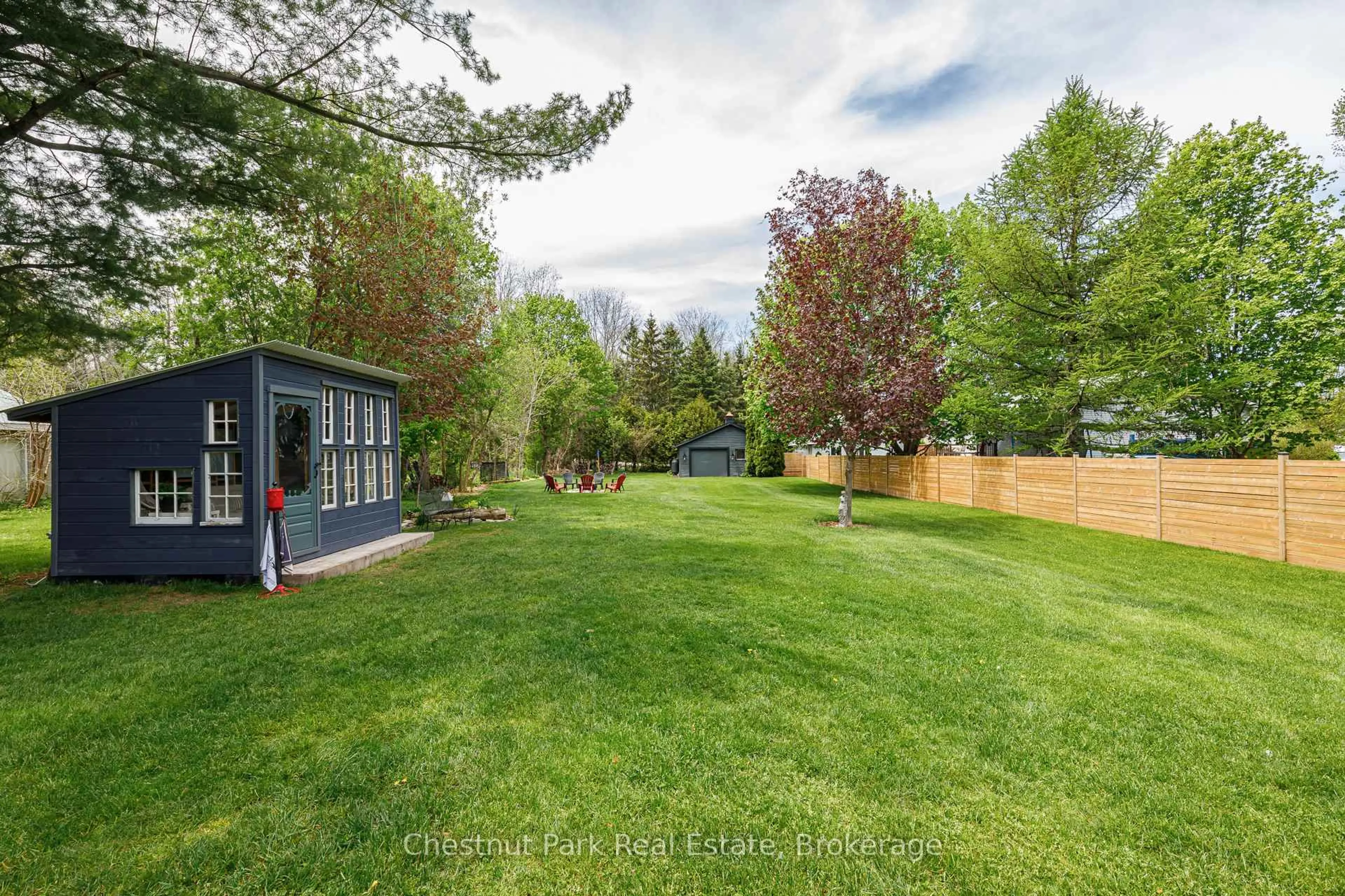 A pic from outside/outdoor area/front of a property/back of a property/a pic from drone, forest/trees view for 119 Hillcrest Dr, Blue Mountains Ontario N0H 1J0