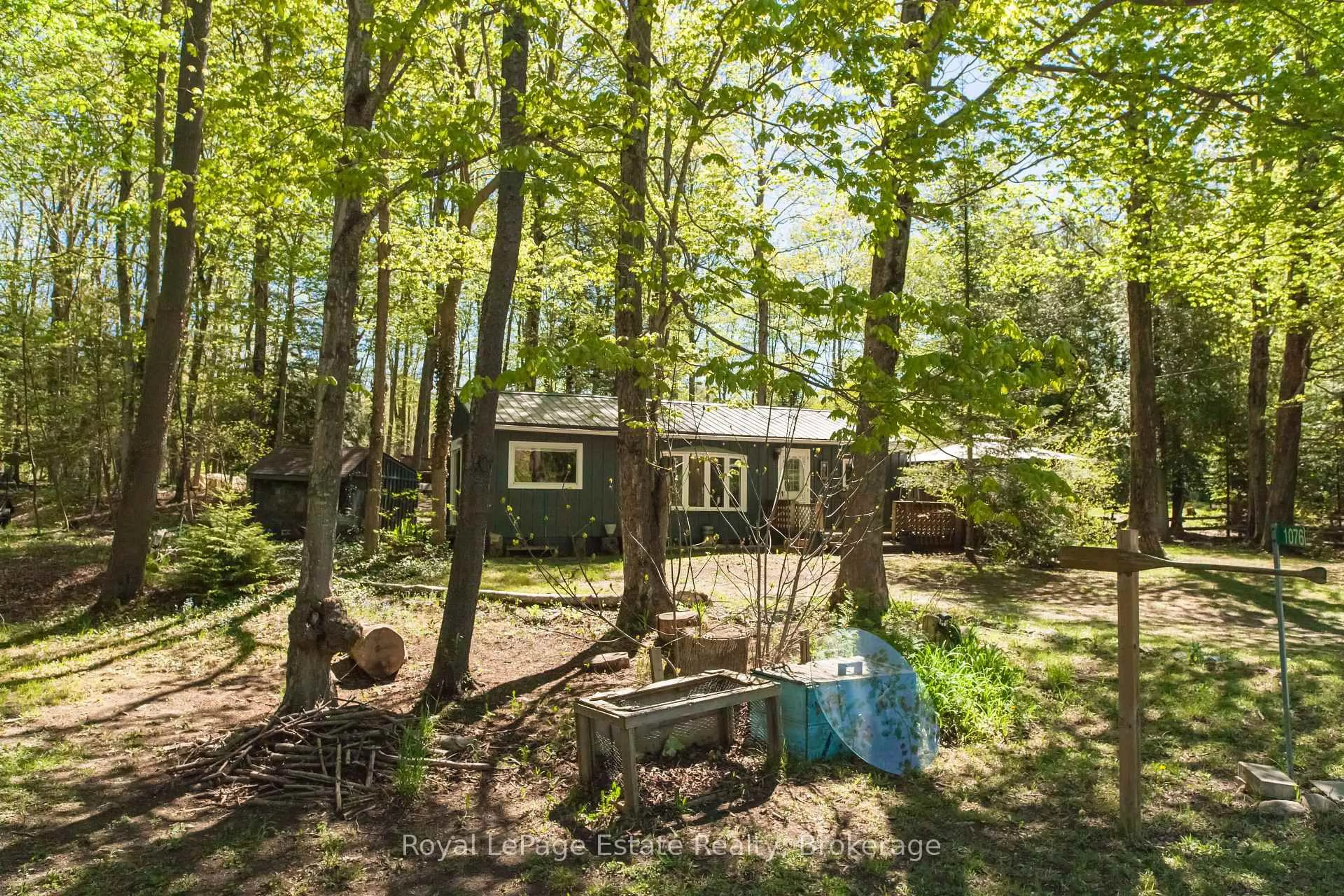 A pic from outside/outdoor area/front of a property/back of a property/a pic from drone, forest/trees view for 1076 FRENCH BAY Rd, Native Leased Lands Ontario N0H 2G0