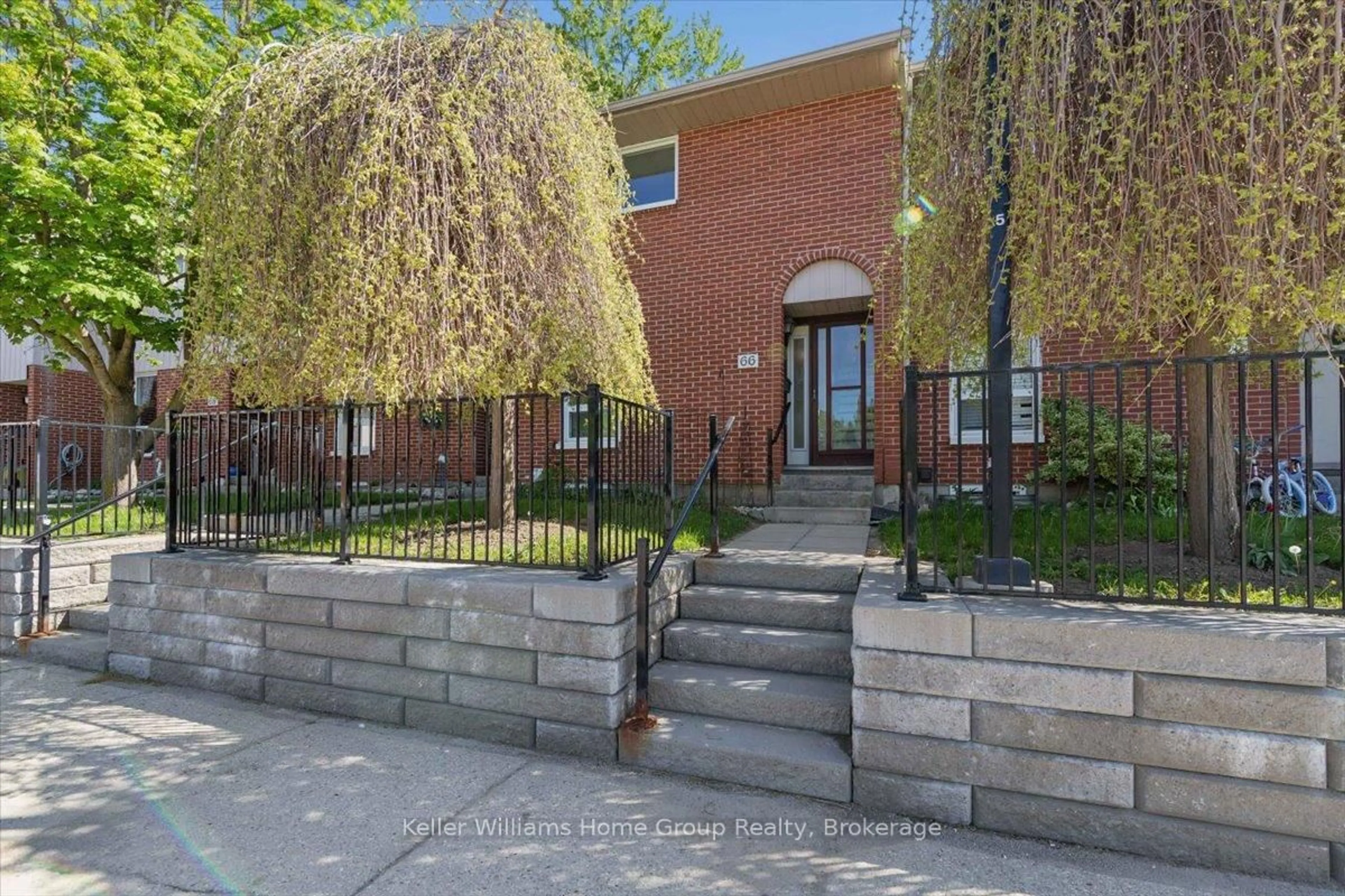 Home with brick exterior material, street for 49 Rhonda Rd #66, Guelph Ontario N1H 7A4